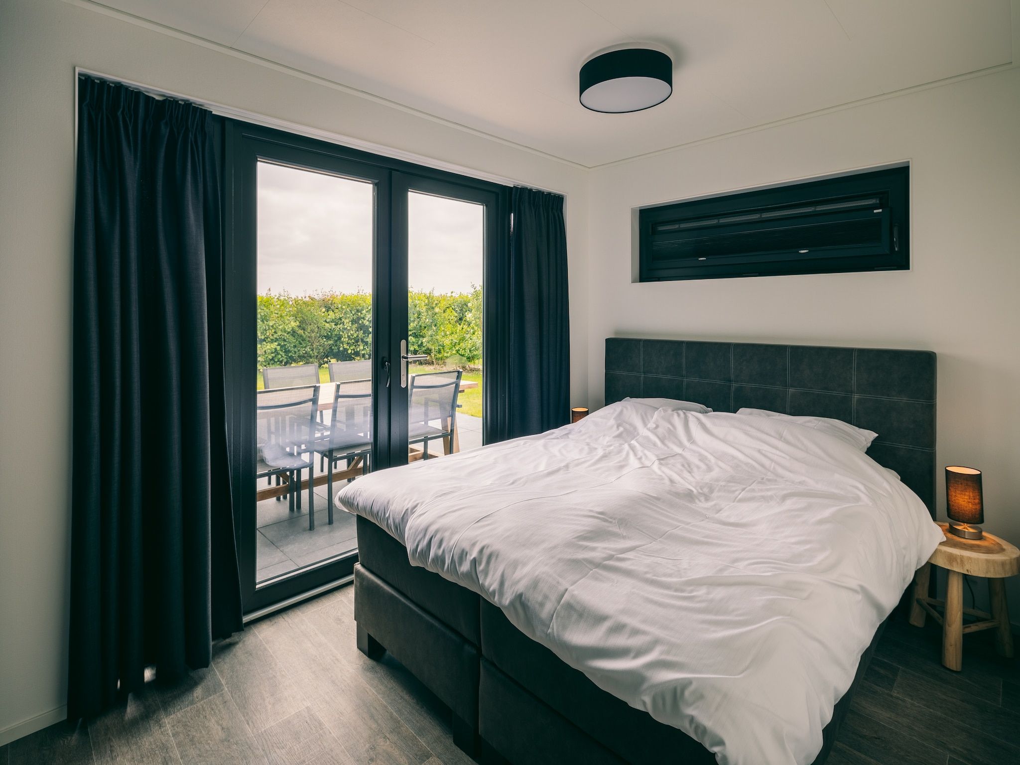 Een slaapkamer van Vakantiepark Zeedijk 3 in Herkingen