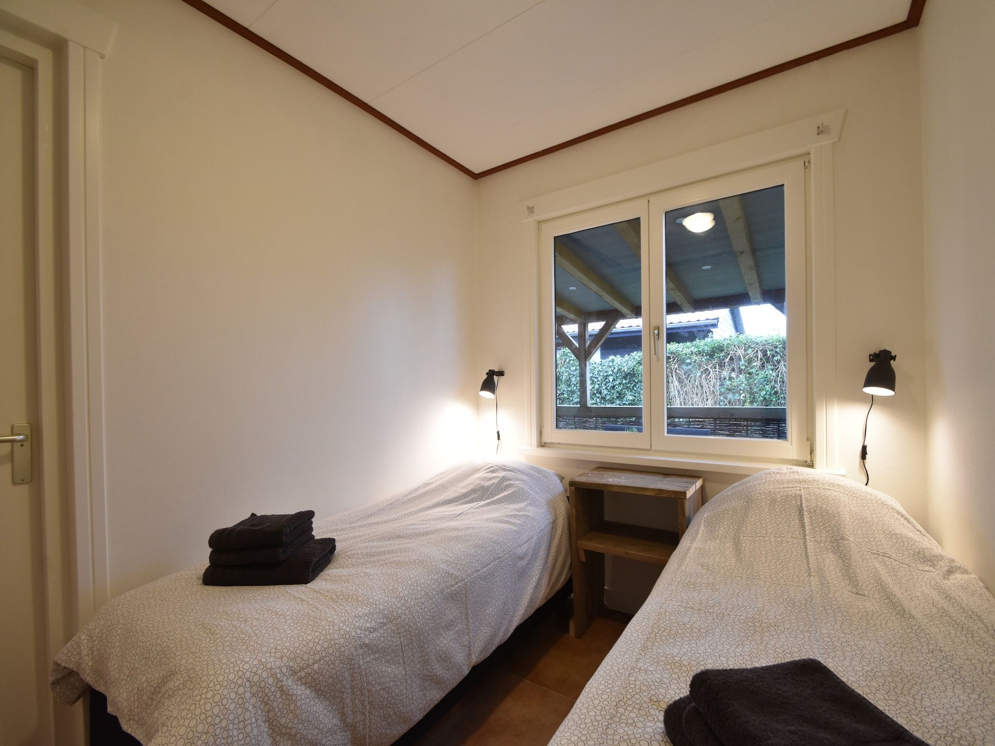 Een slaapkamer van 8p Garnekuul 1 in Callantsoog