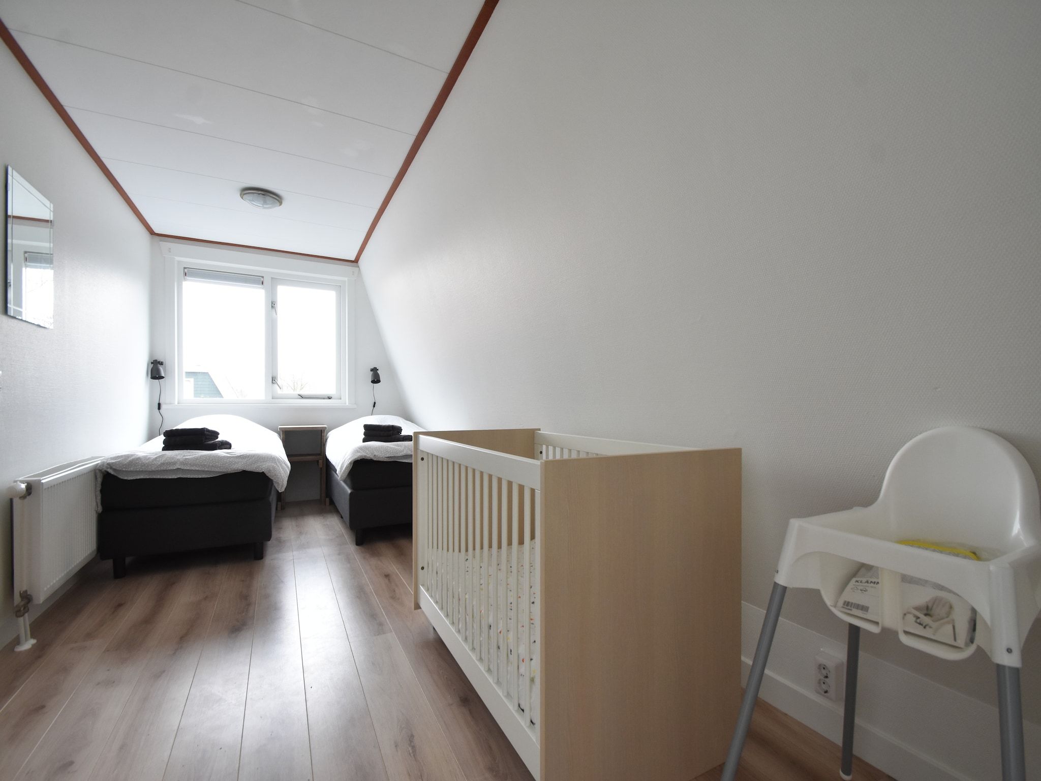 Een slaapkamer van 8p Garnekuul 1 in Callantsoog