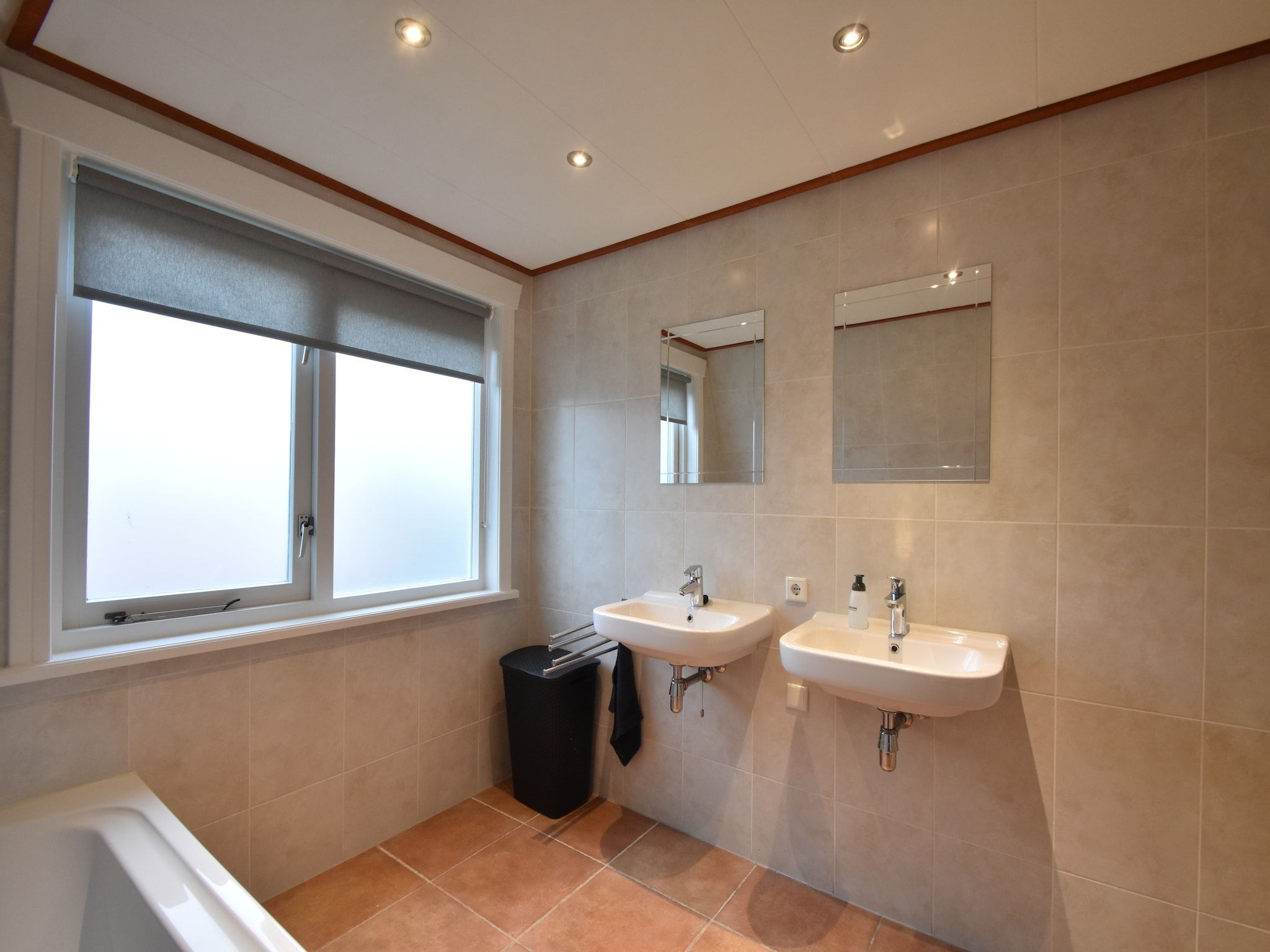 De badkamer van 8p Garnekuul 1 in Callantsoog