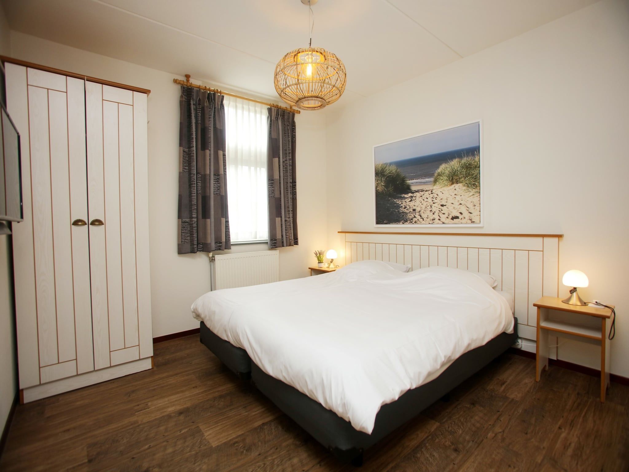 Een slaapkamer van Kustpark Texel 11 in De Koog