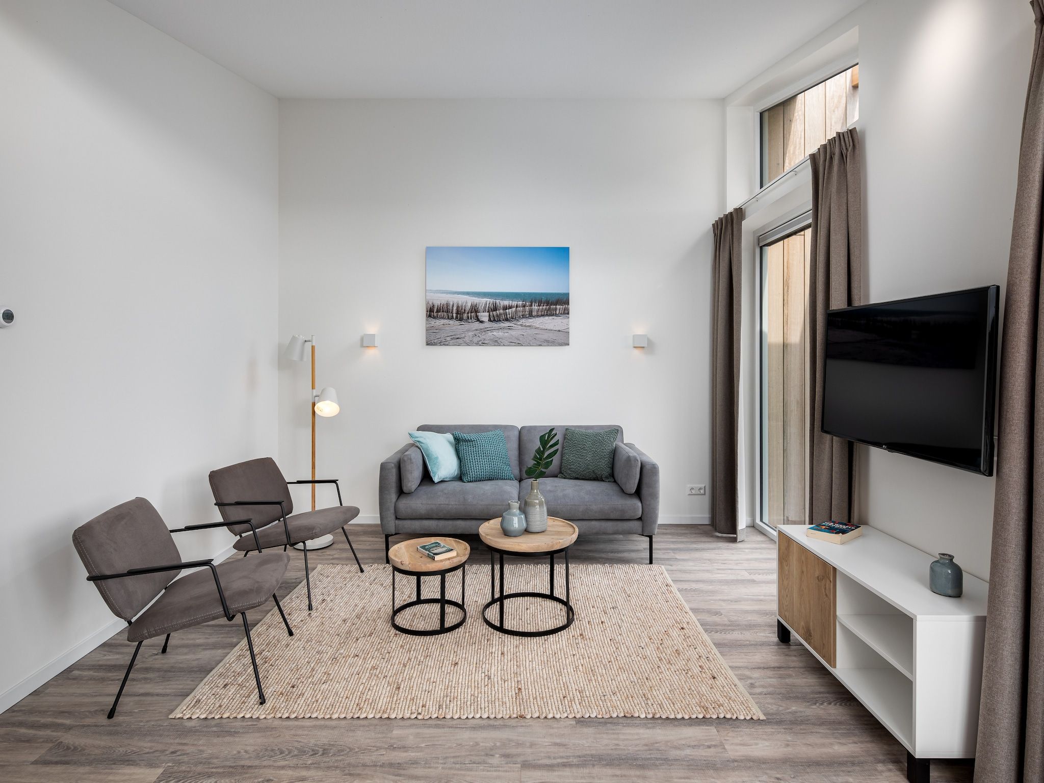 De woonkamer van Water Village 2 in Kamperland