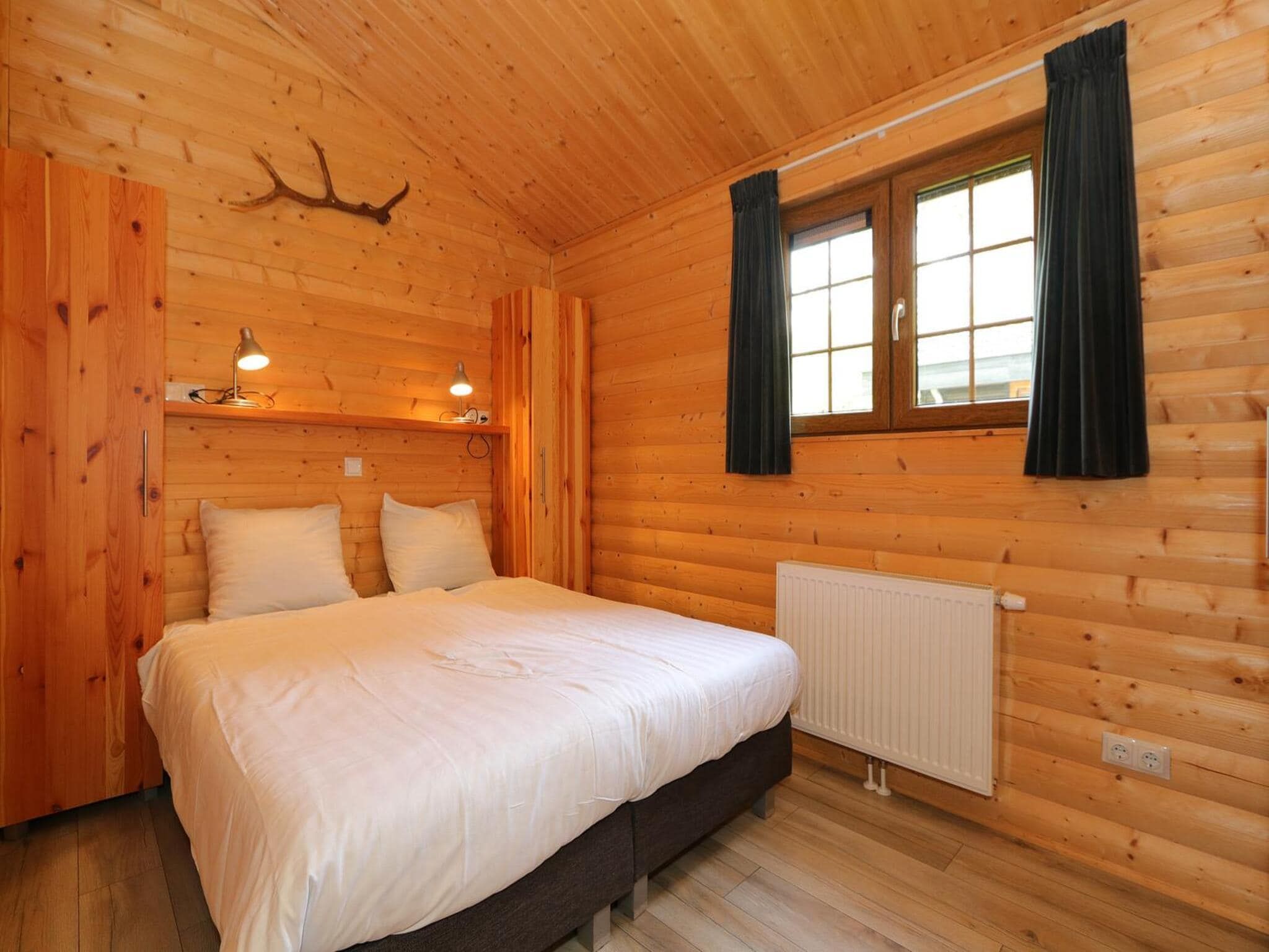 Een slaapkamer van Boekhorst 5 in Otterlo