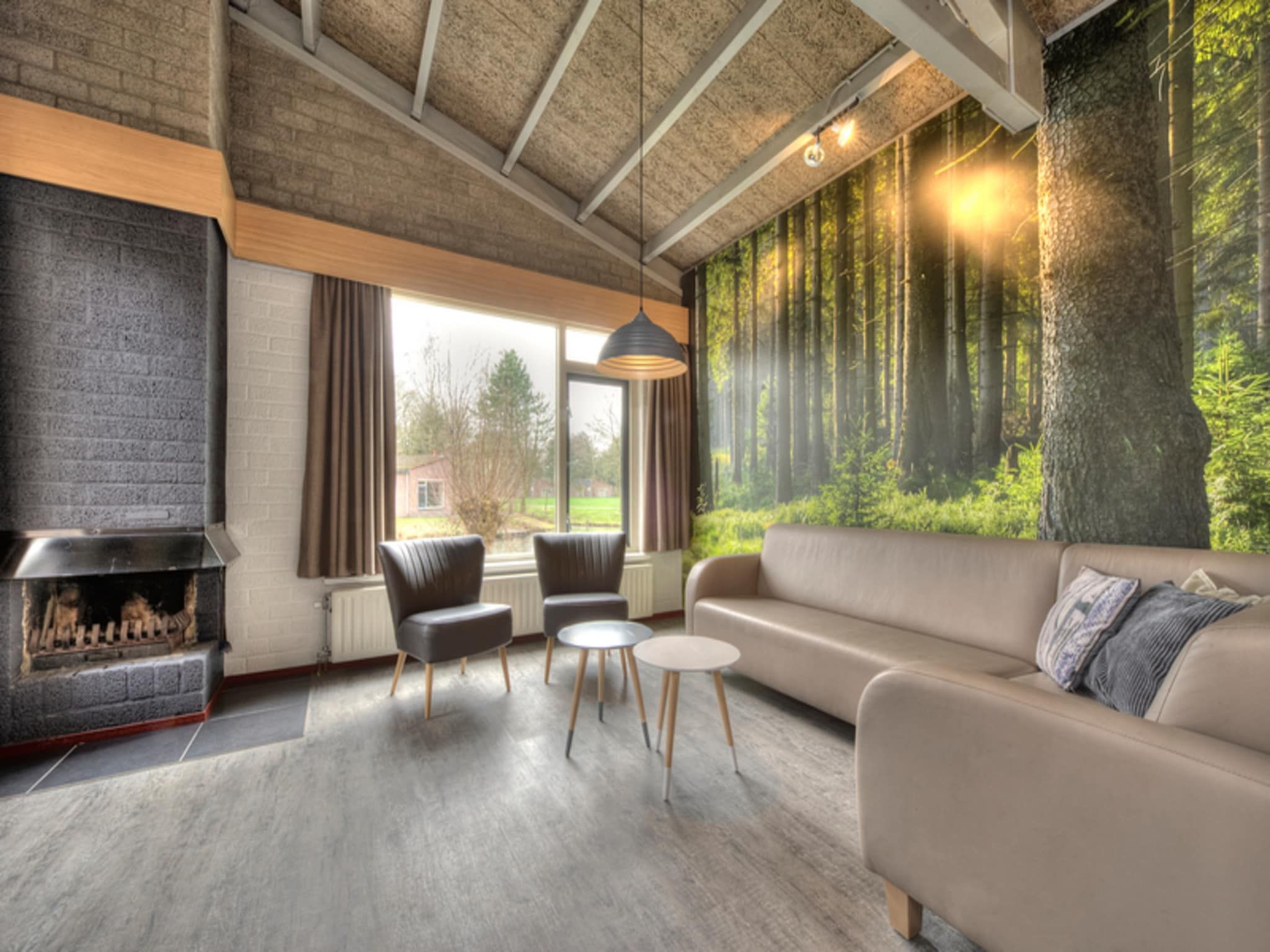 De woonkamer van Vakantiepark Weerterbergen 8 in Weert