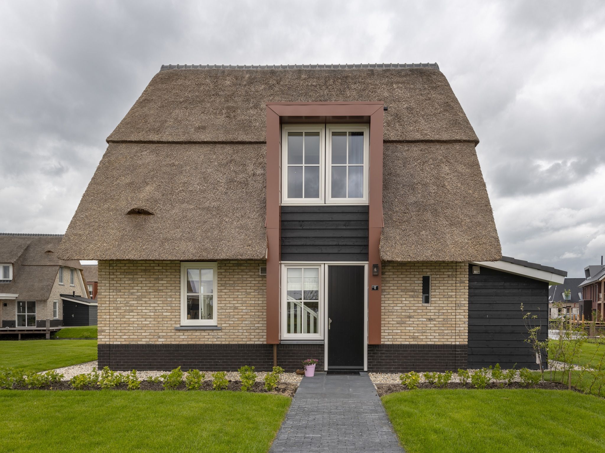 De buitenkant van Friese Meren Villa's 2 in Delfstrahuizen