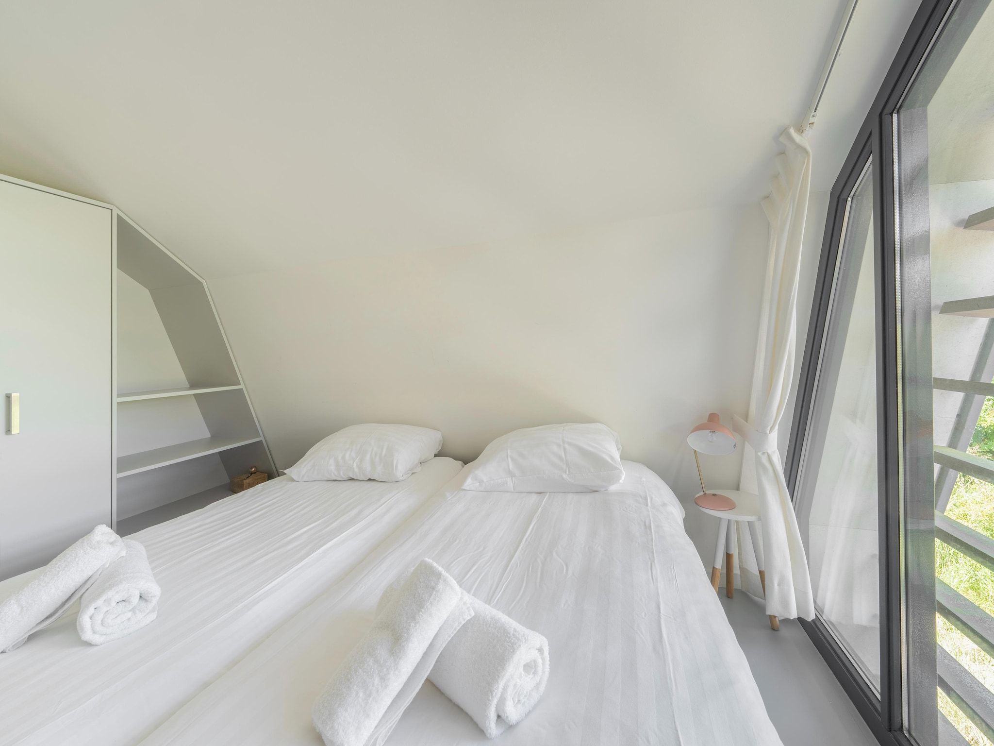 Een slaapkamer van Duinvilla aan het Meer in Egmond aan den Hoef