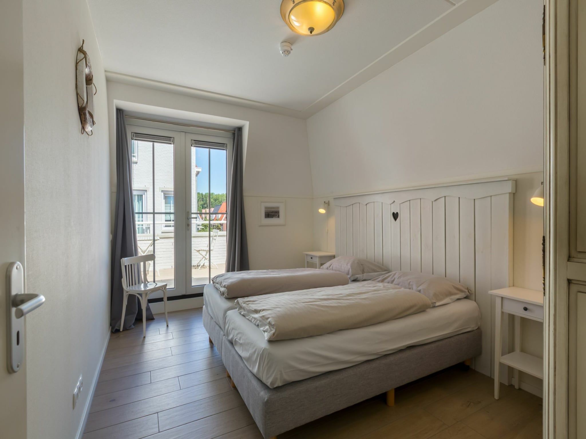 Een slaapkamer van Appartement Duinhof Dishoek 13K - 6 personen de luxe in Koudekerke