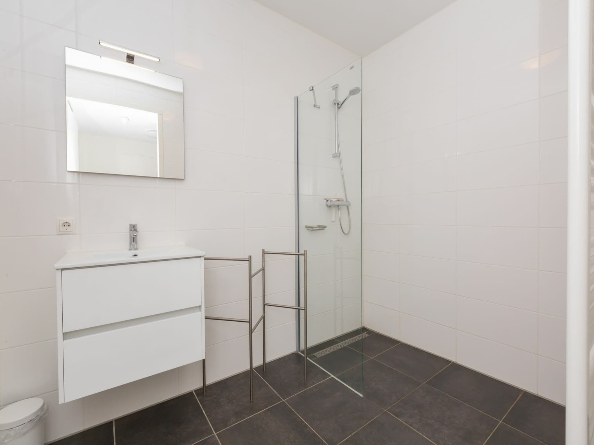 De badkamer van Appartement Duinhof Dishoek 13H - 6 pers de luxe in Koudekerke
