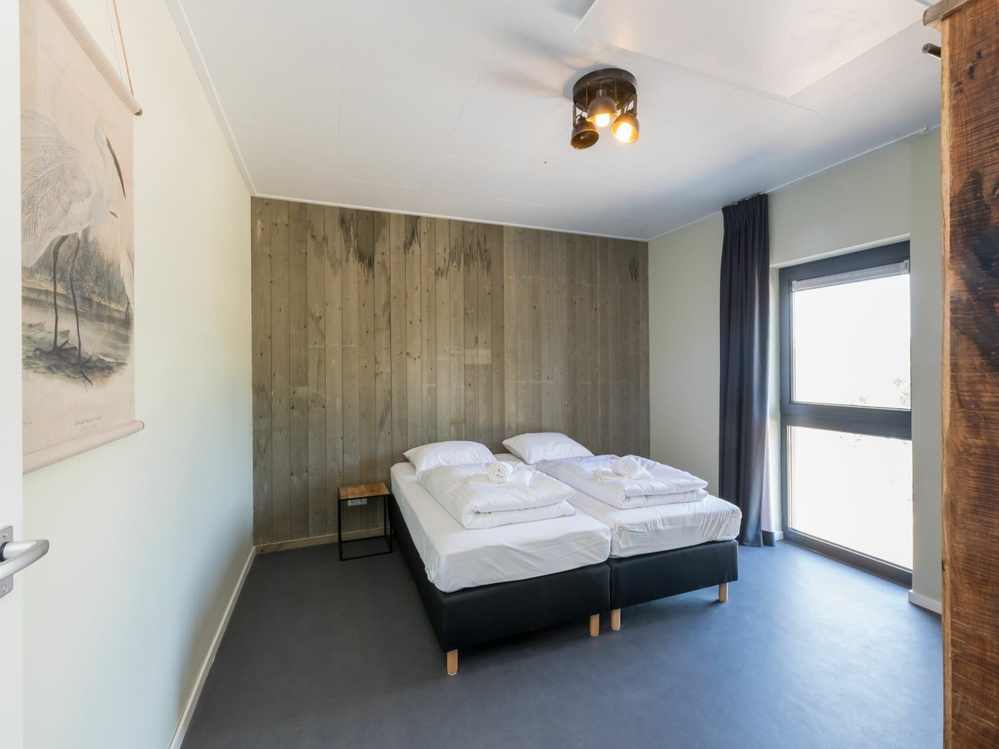 Een slaapkamer van Vroondijk 2- duinappel en zonnebes in Vrouwenpolder