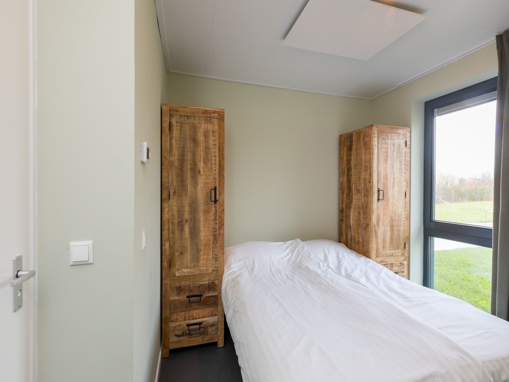 Een slaapkamer van Vroondijk 2-Zeebloesem in Vrouwenpolder