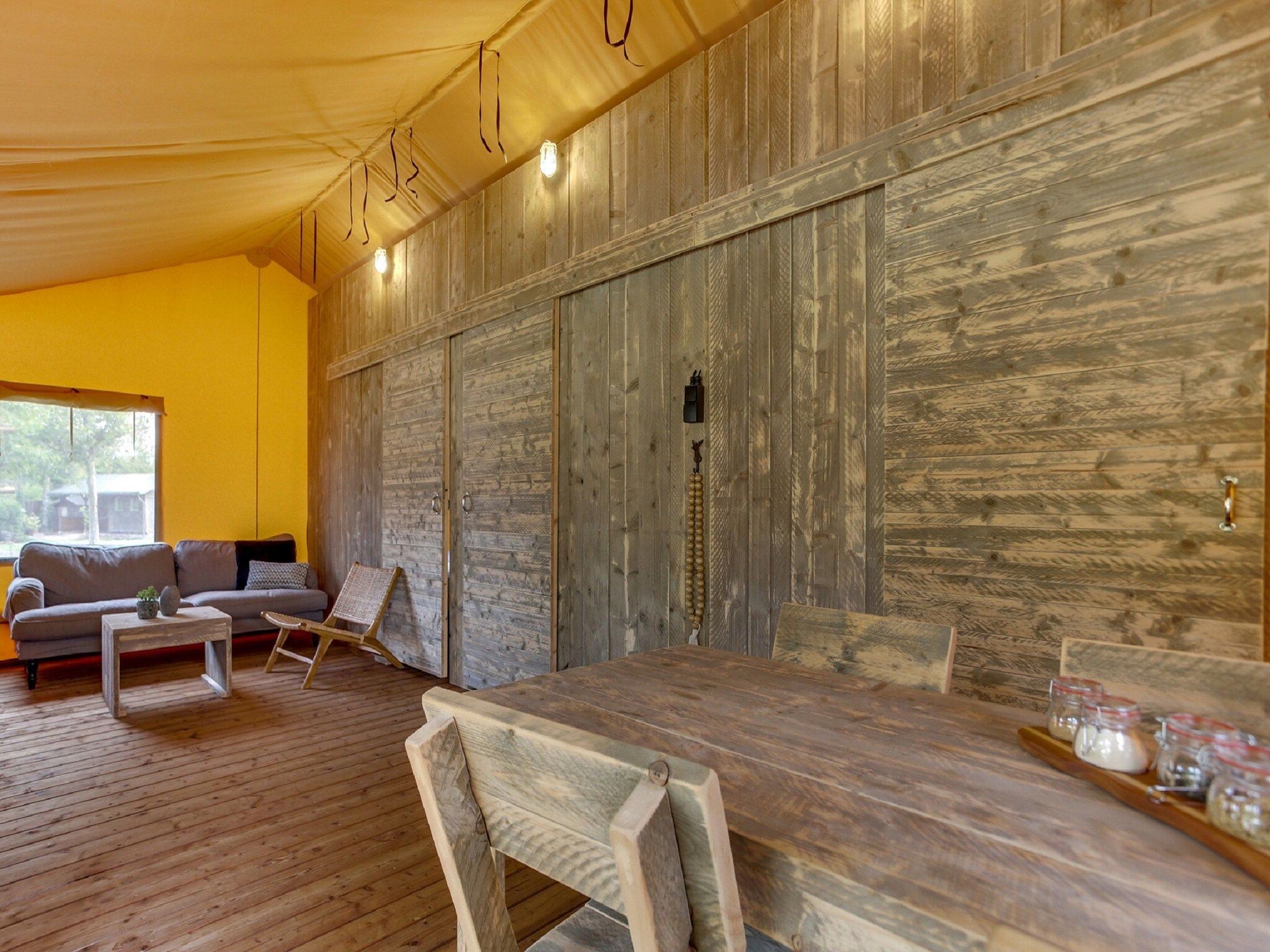 De woonkamer van Vakantiepark Sandberghe 9 in Uden