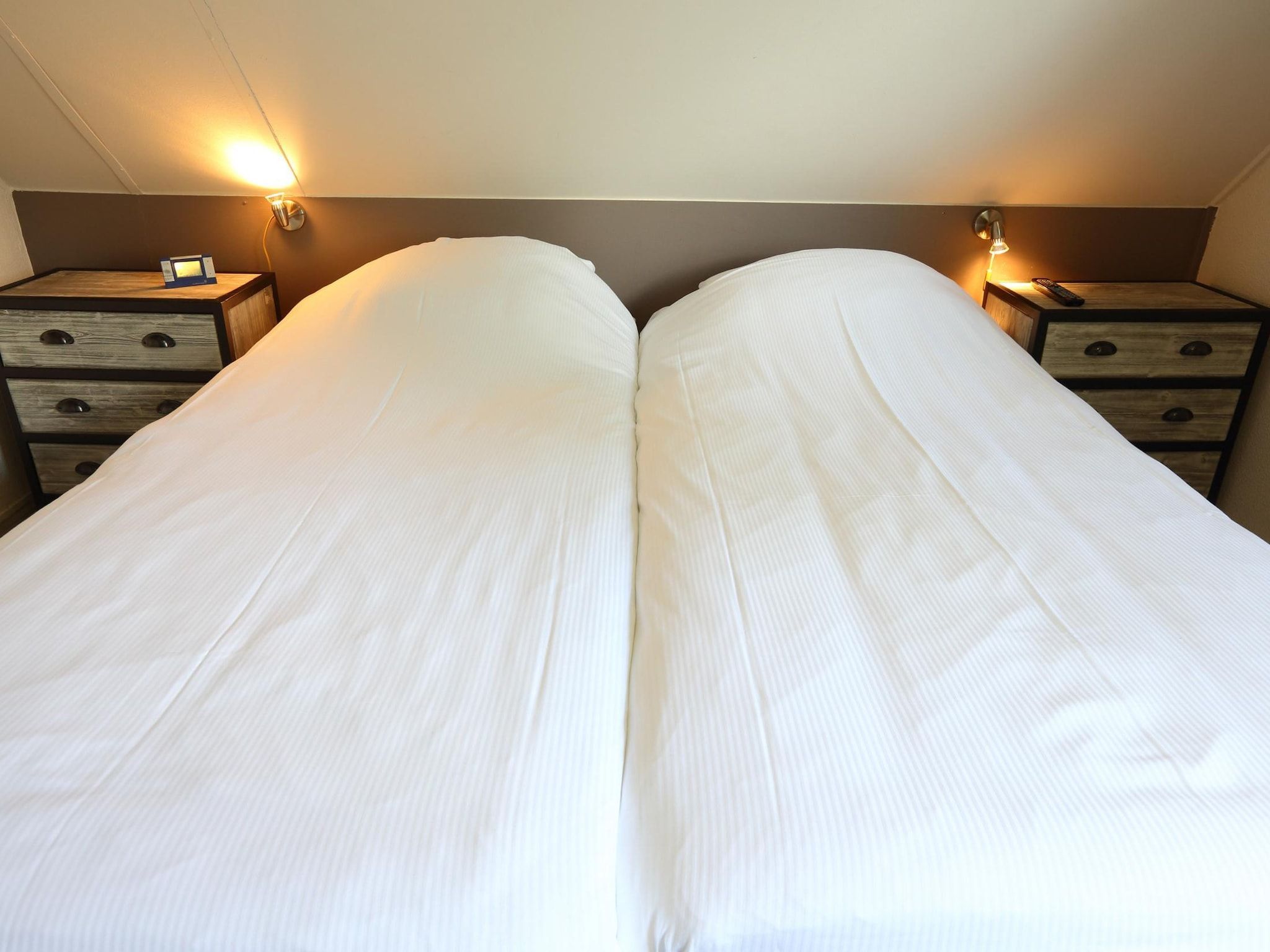 Een slaapkamer van Vakantiepark Emslandermeer 2 in Vlagtwedde