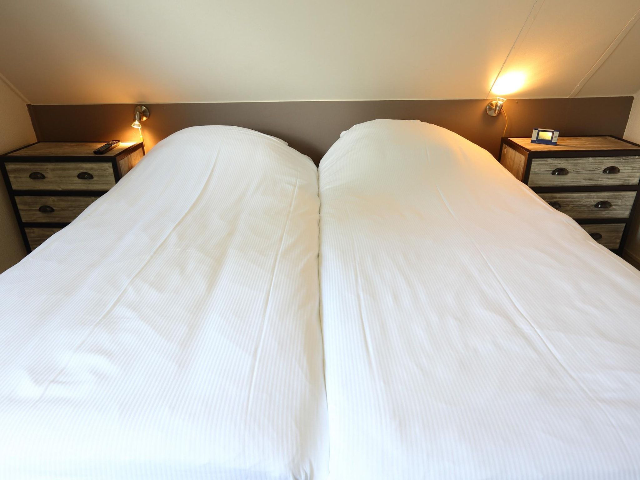 Een slaapkamer van Vakantiepark Emslandermeer 2 in Vlagtwedde