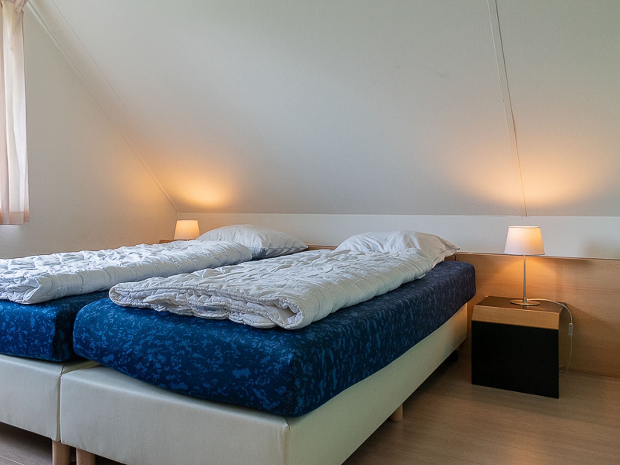 Een slaapkamer van Vakantiepark Emslandermeer 3 in Vlagtwedde