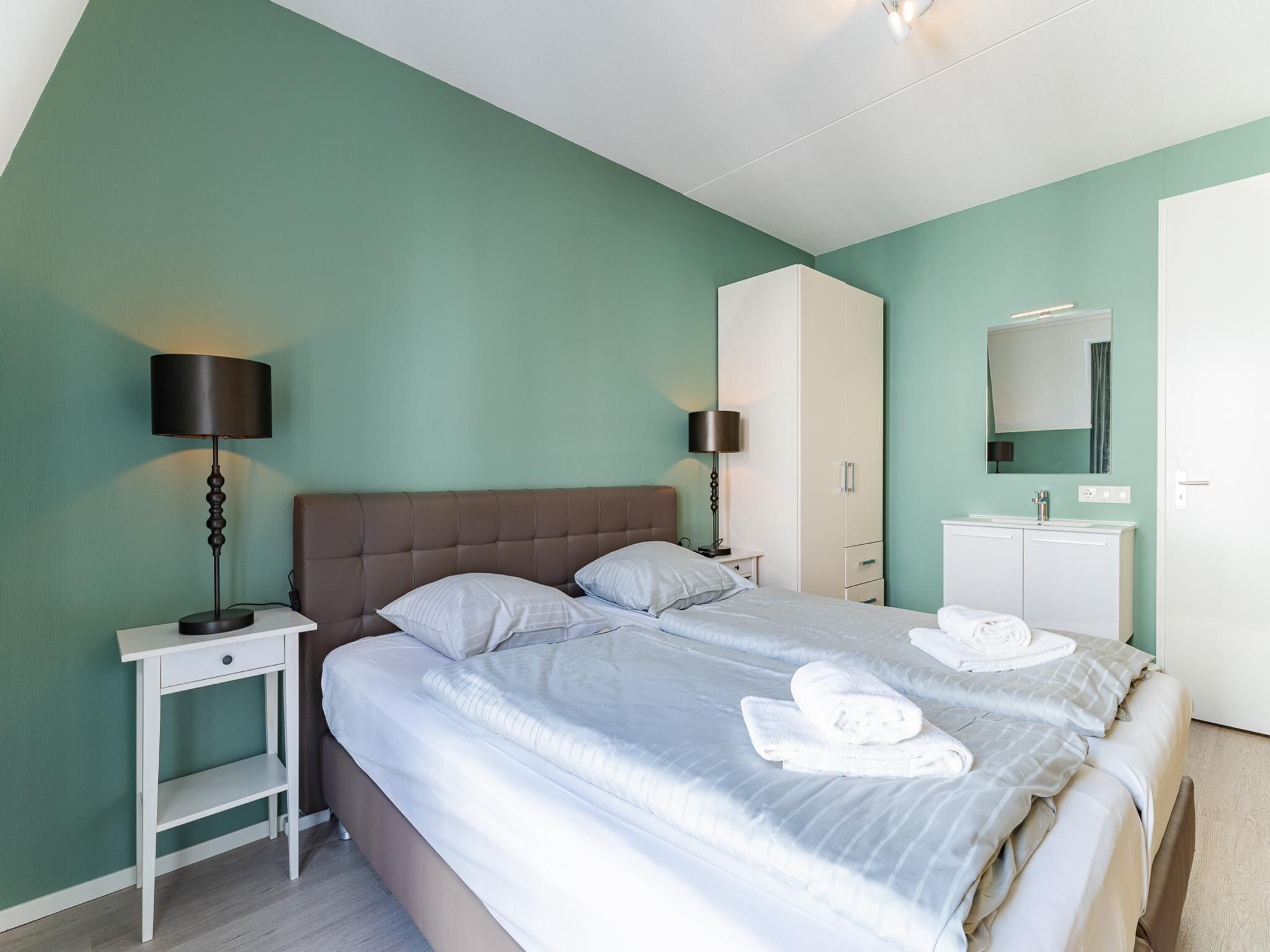 Een slaapkamer van Appartement Duinhof Dishoek 13M - 6 personen de luxe in Koudekerke