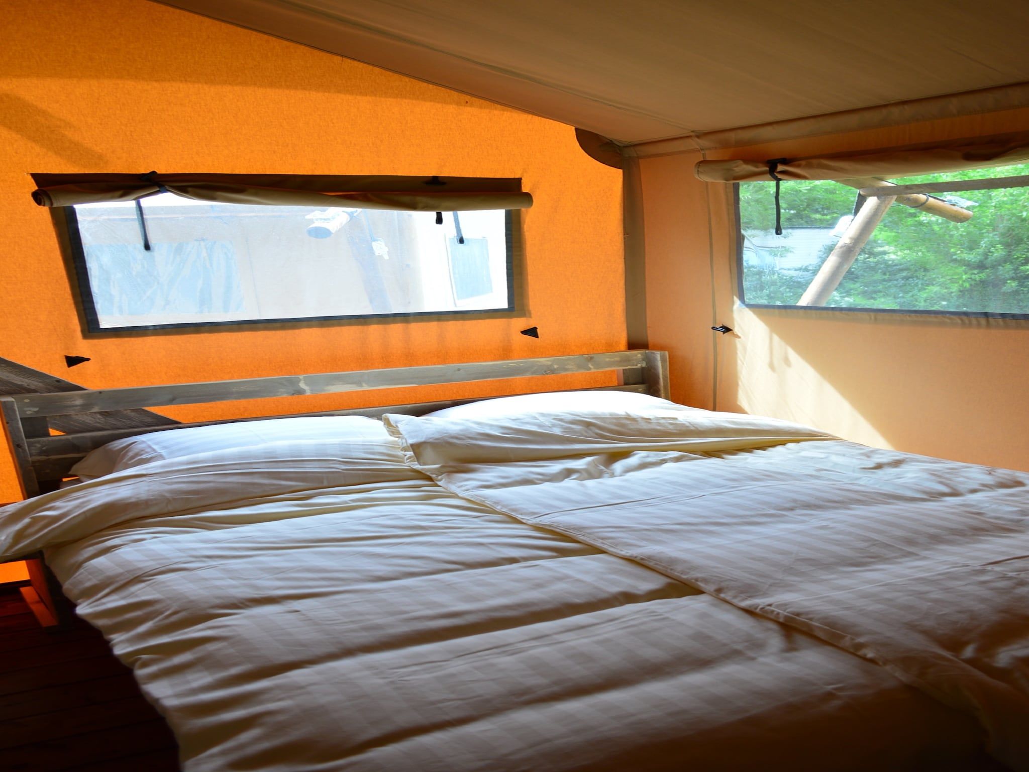 Een slaapkamer van Strandpark Vlugtenburg 12 in 's-Gravenzande