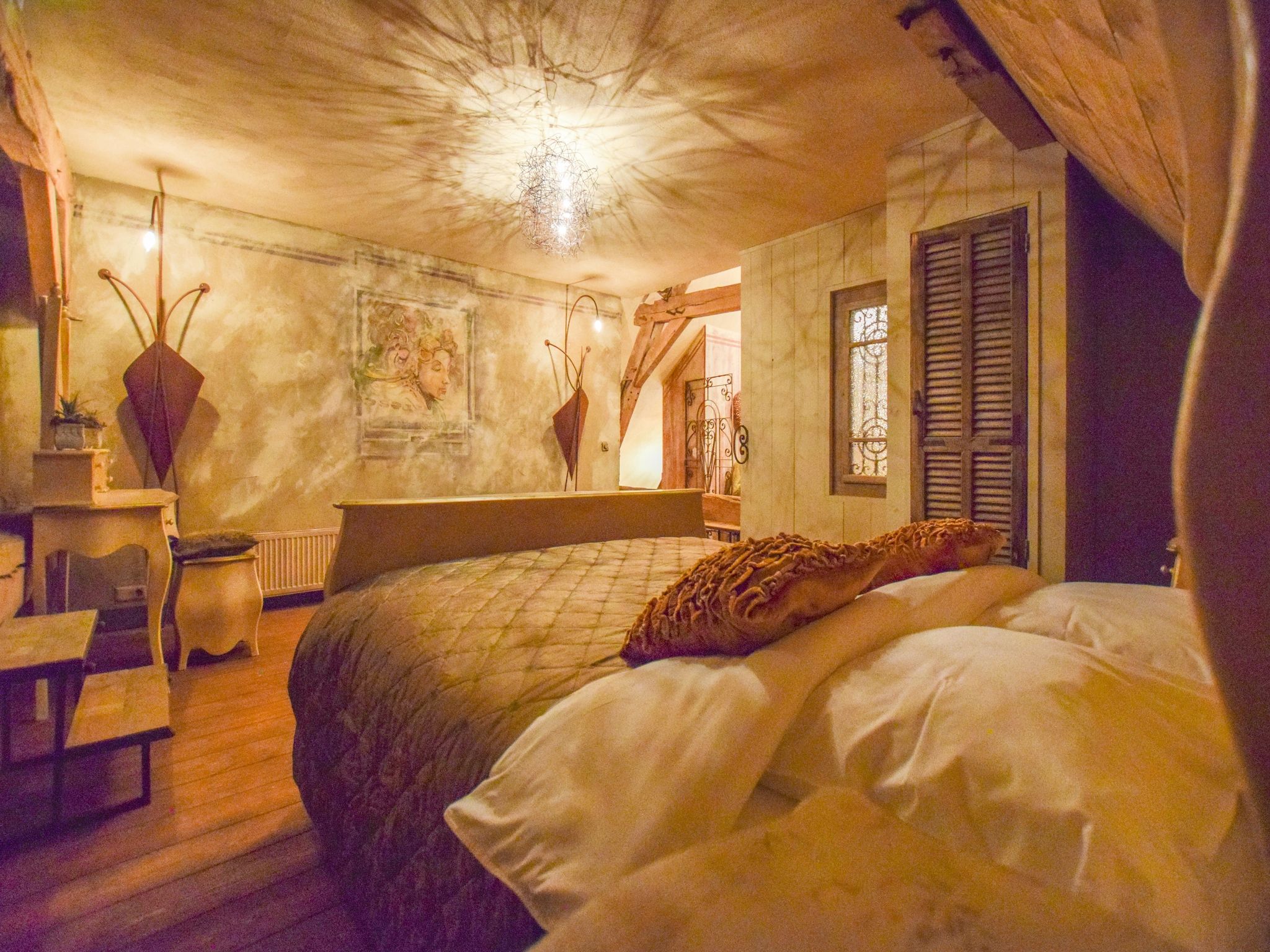 Een slaapkamer van La Maison Douce in Alphen