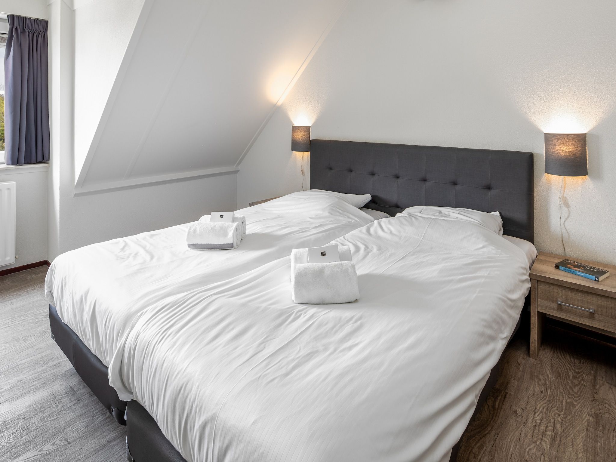 Een slaapkamer van Noordzee Résidence De Banjaard 1 in Kamperland