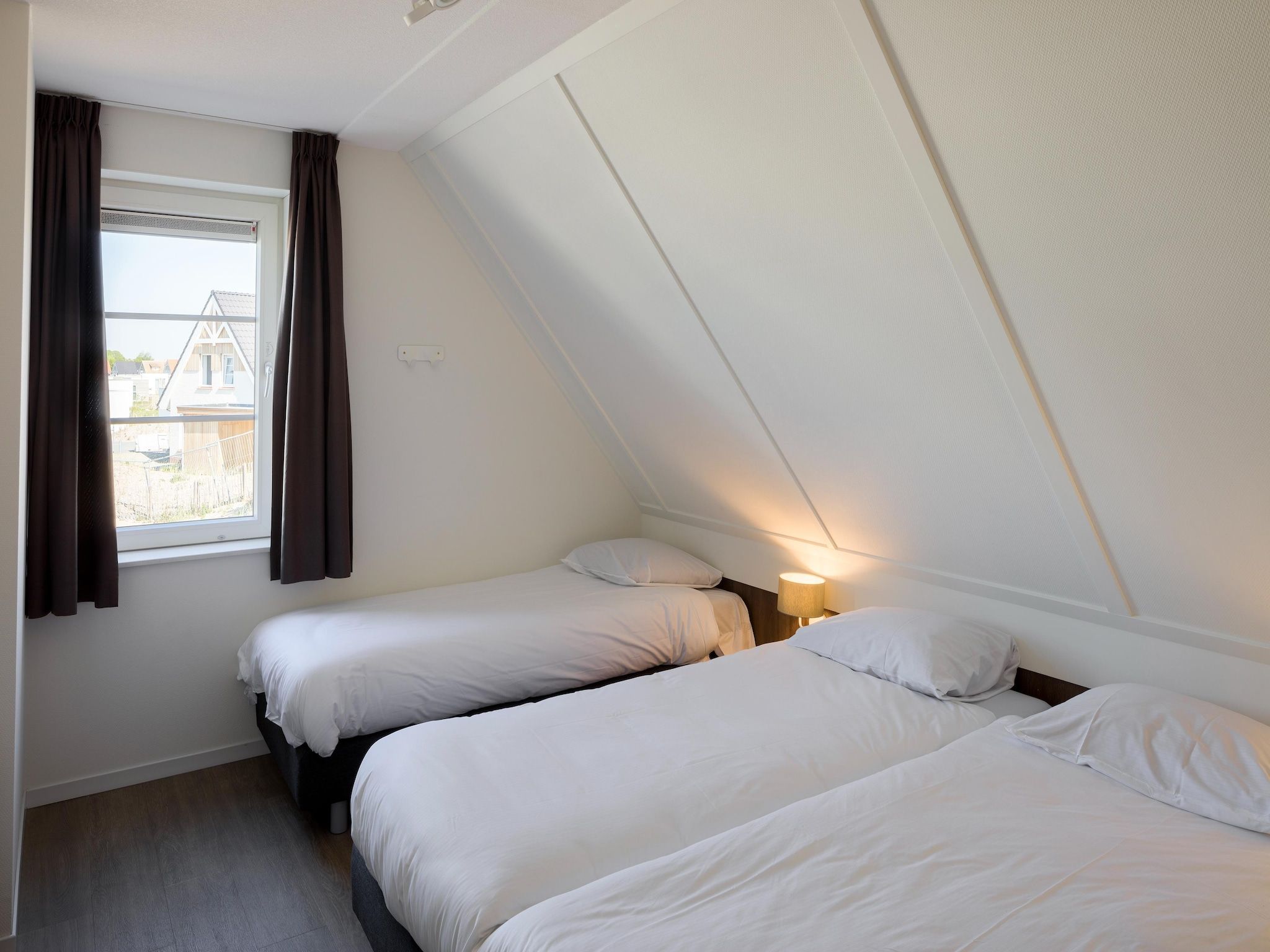 Een slaapkamer van Beach Resort Nieuwvliet-Bad 10 in Nieuwvliet-Bad