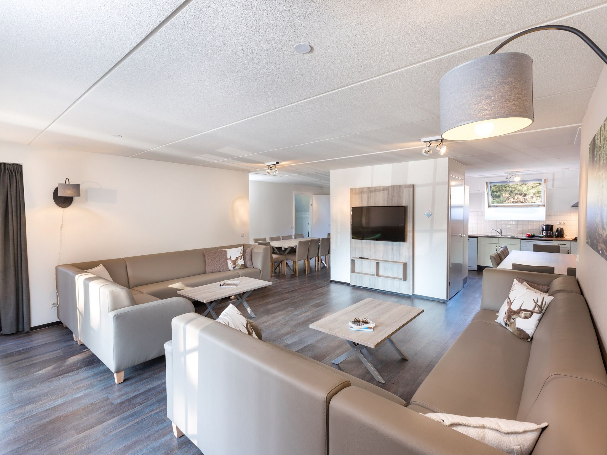 De woonkamer van Vakantiepark de Katjeskelder 12 in Oosterhout