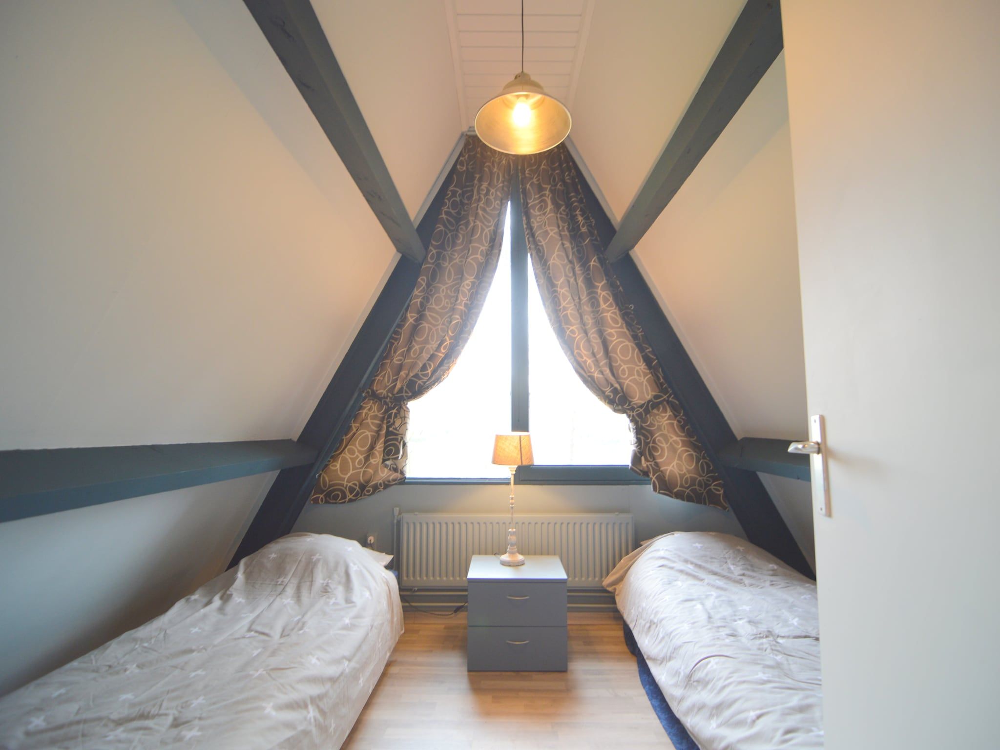 Een slaapkamer van Bungalow 64 en 65 in Stramproy