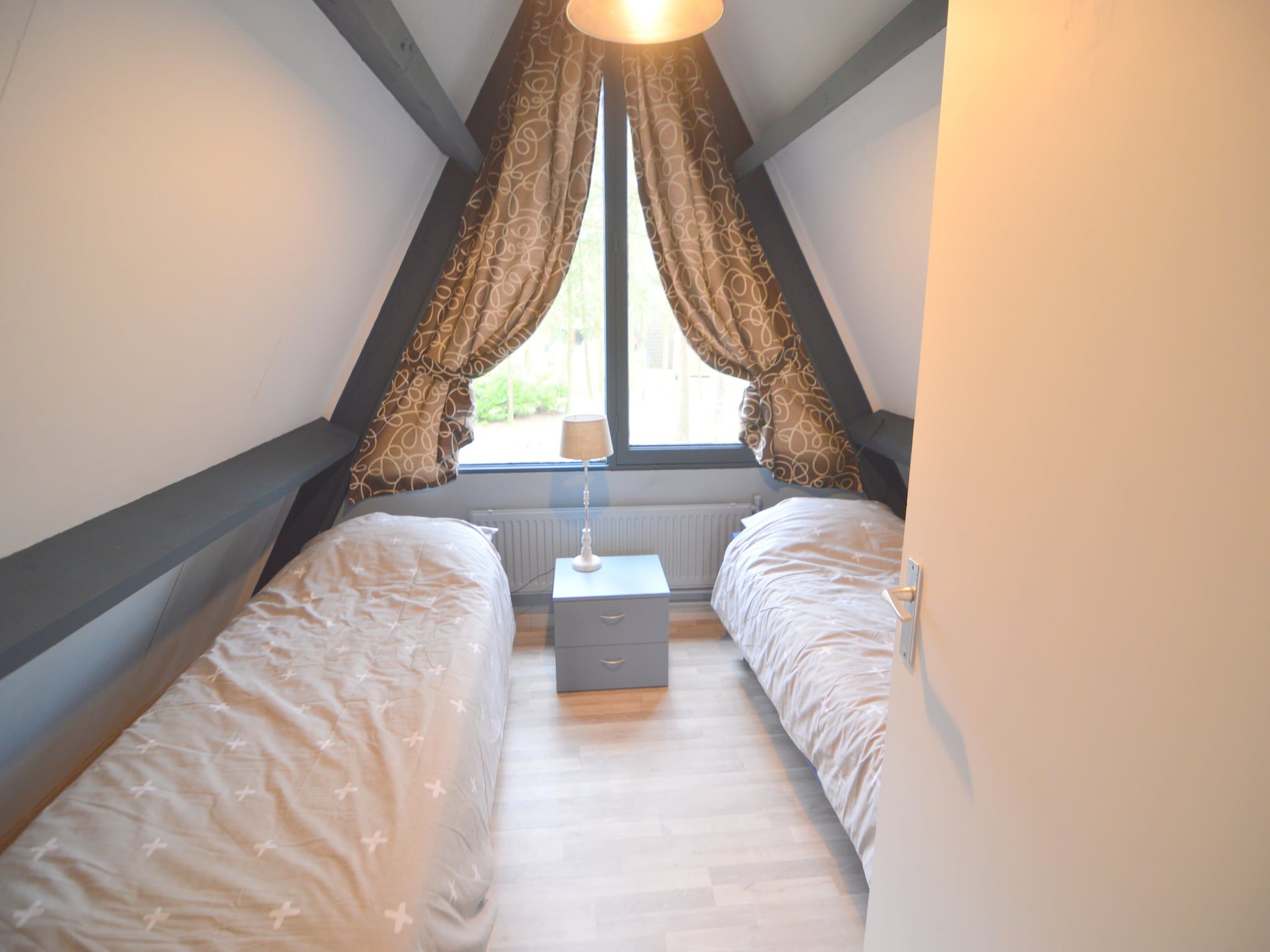 Een slaapkamer van Bungalow 64 en 65 in Stramproy