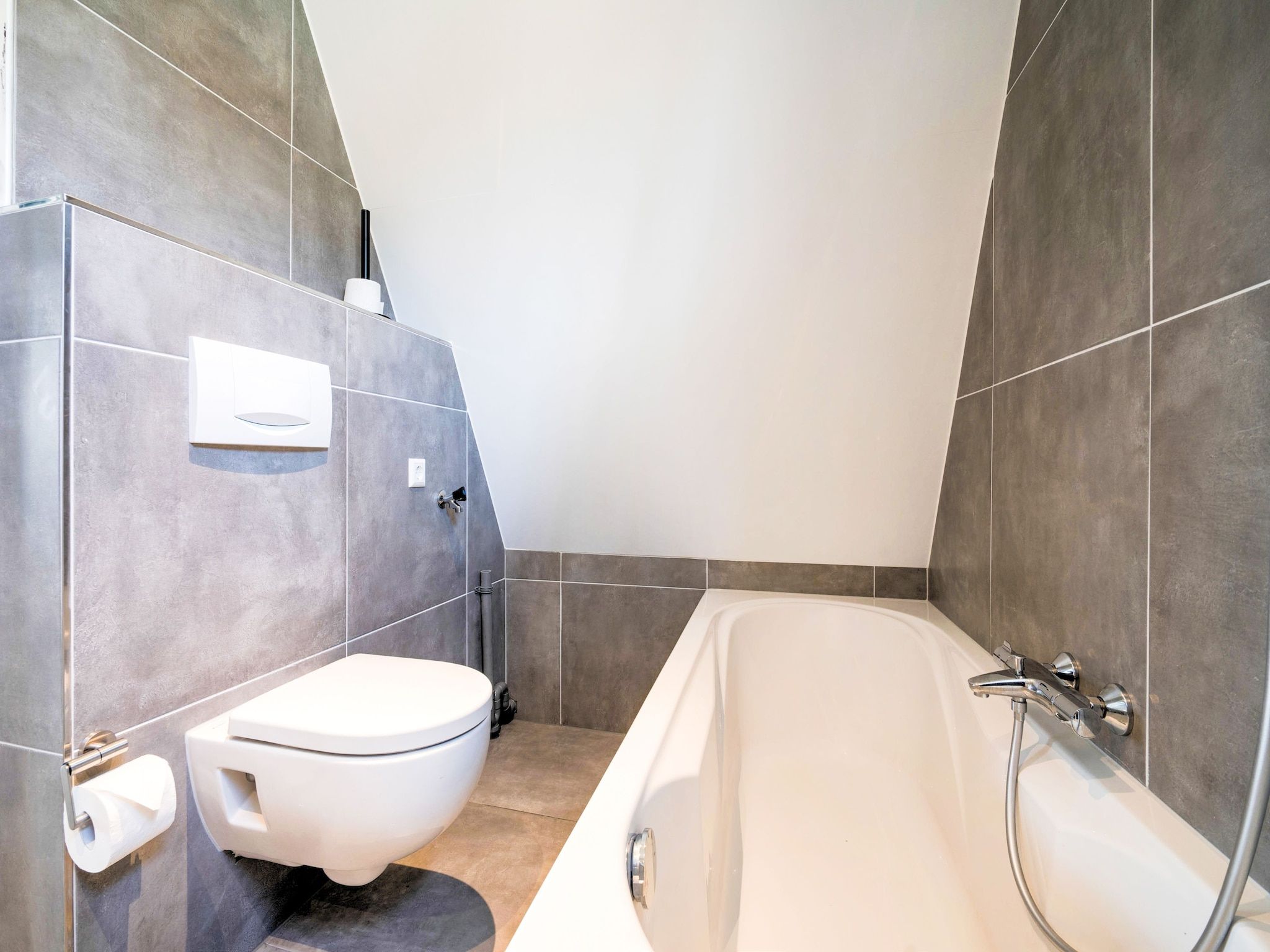 De badkamer van Bungalow 64 en 65 in Stramproy