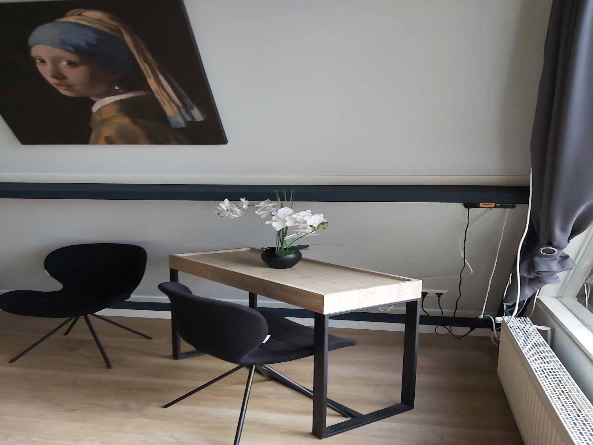 De woonkamer van Bungalow 64 en 65 in Stramproy