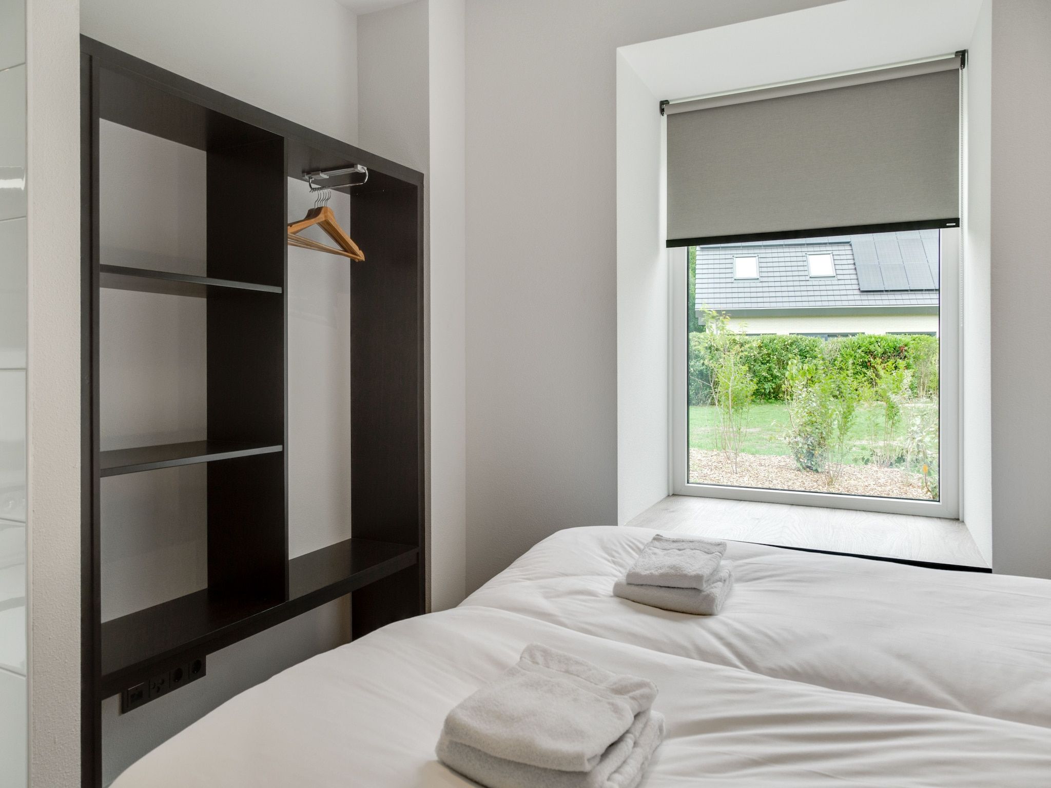 Een slaapkamer van De Koog nr 2 - 6 pers woning de luxe in De Koog Texel North Holland