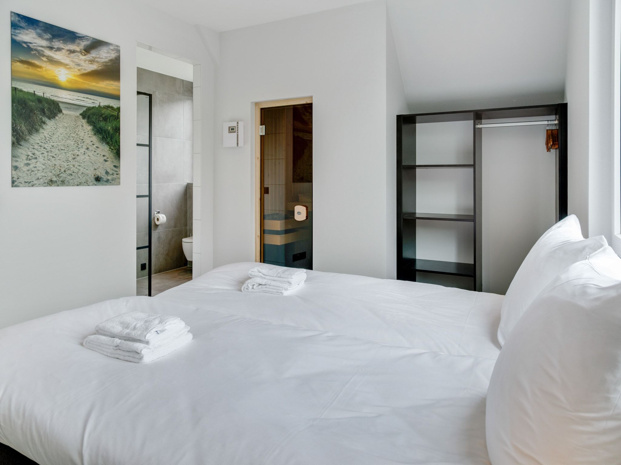 Een slaapkamer van De  Koog  nr 3 - 6 pers woning de luxe in De Koog Texel