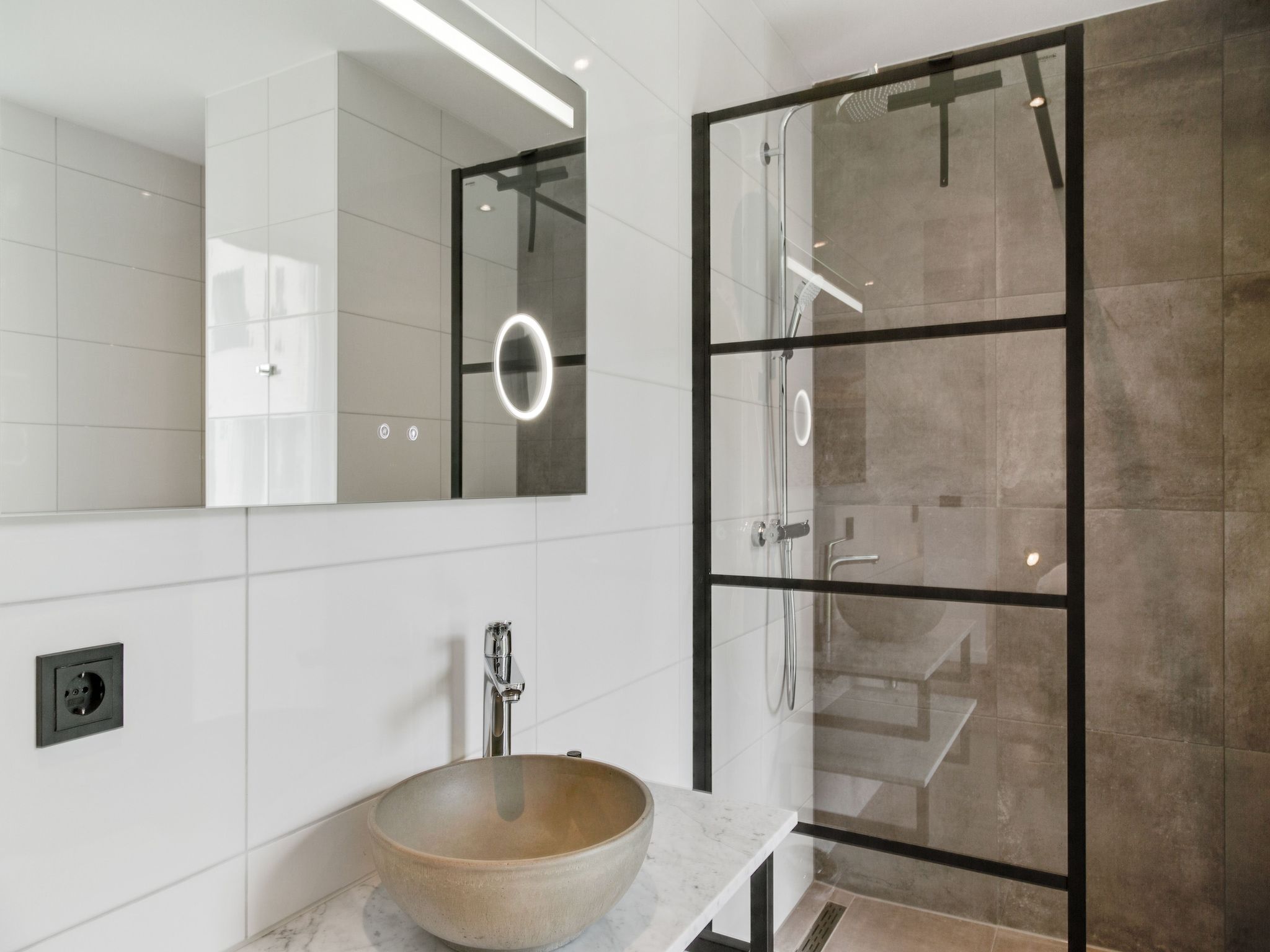 De badkamer van De Koog  nr 5 - 6 pers woning de luxe in De Koog Texel