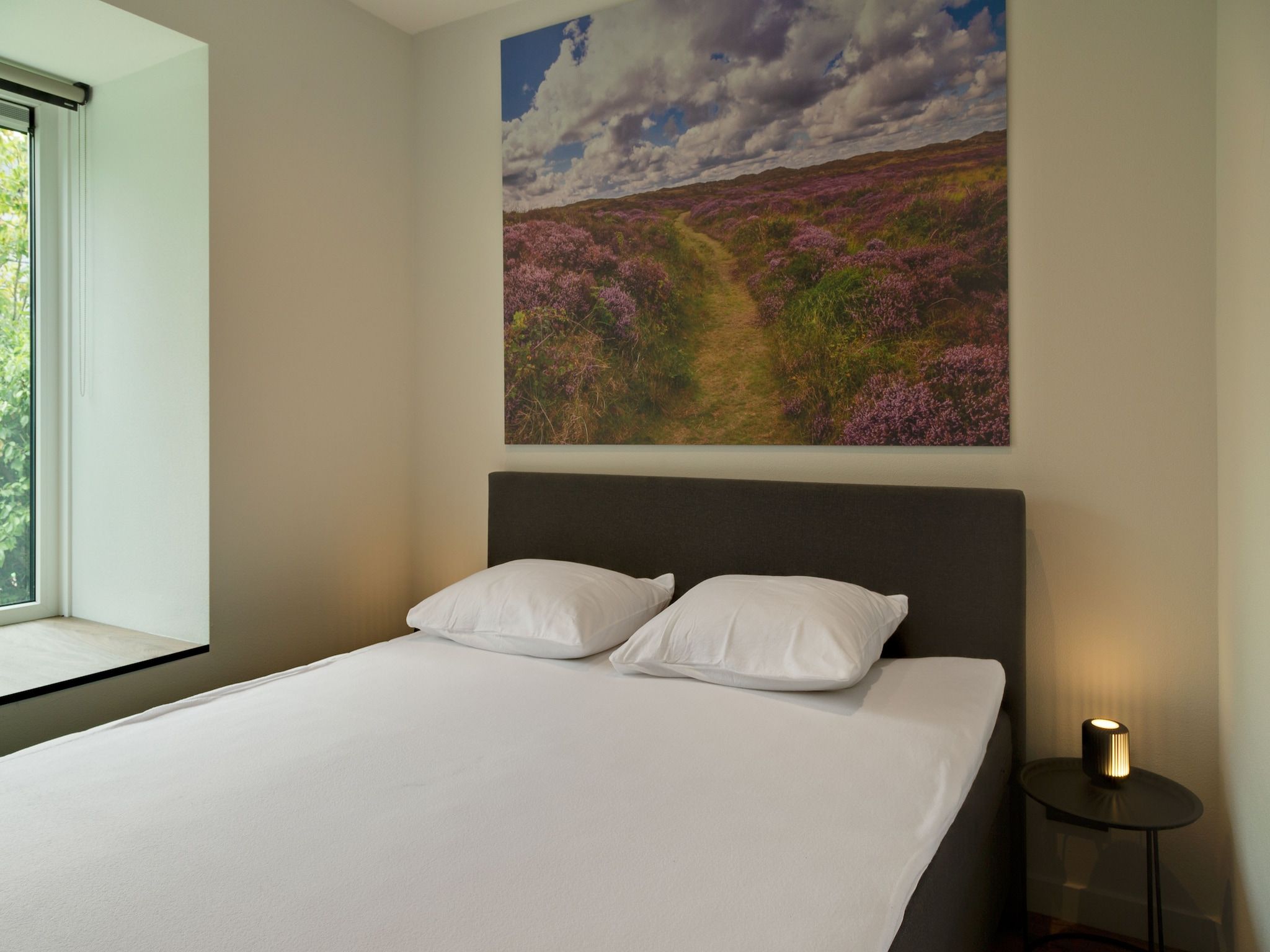 Een slaapkamer van De Koog nr 6 tm 10- 6 pers woning de luxe in De Koog Texel