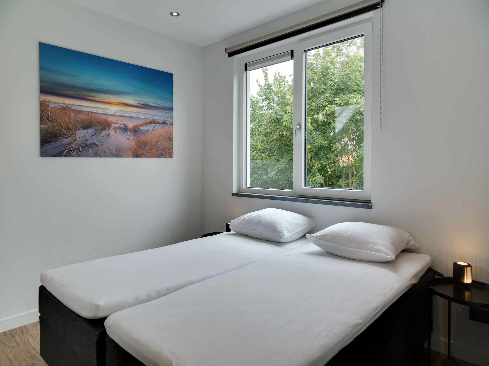 Een slaapkamer van De Koog nr 6 tm 10- 6 pers woning de luxe in De Koog Texel