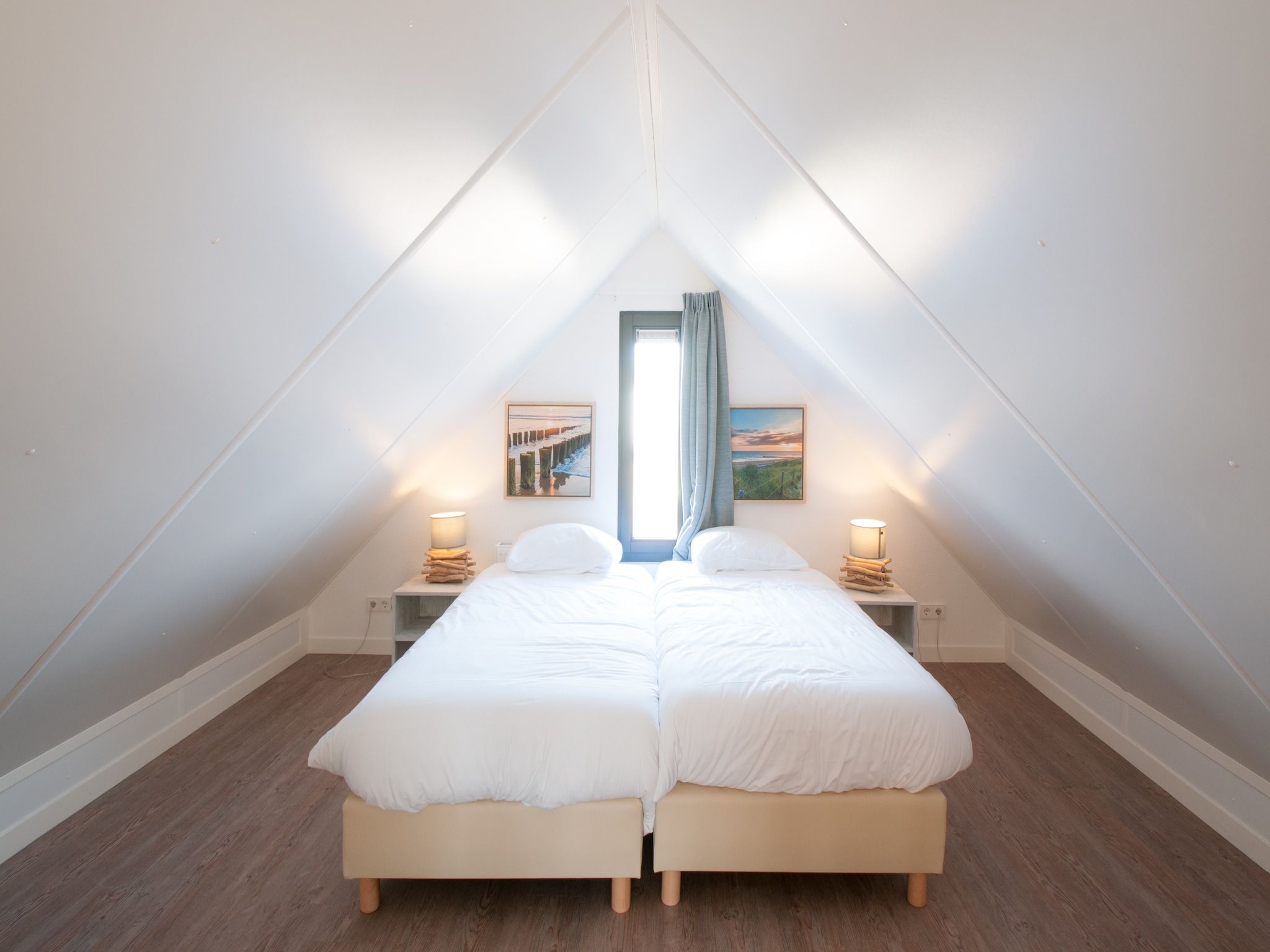 Een slaapkamer van Resort Waterrijk Oesterdam 1 in Tholen