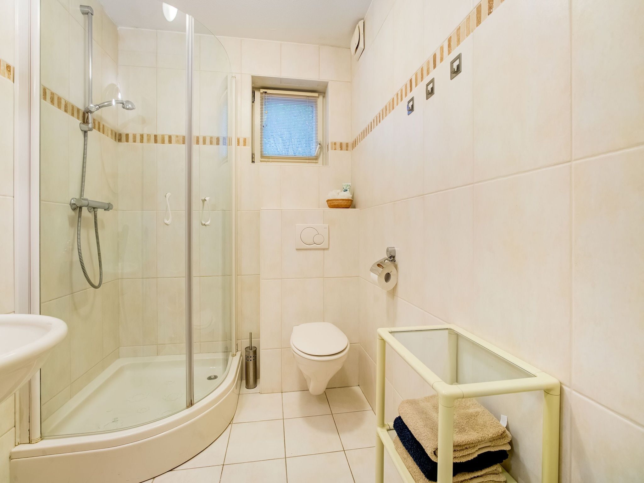 De badkamer van Vakantie appartement De Stelling in Noordwolde