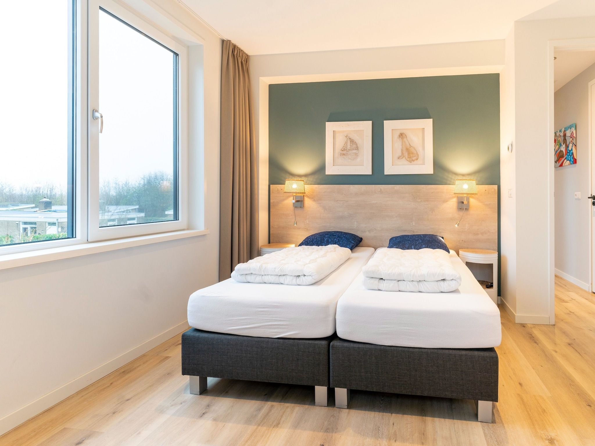 Een slaapkamer van So What 15 in De Koog Texel