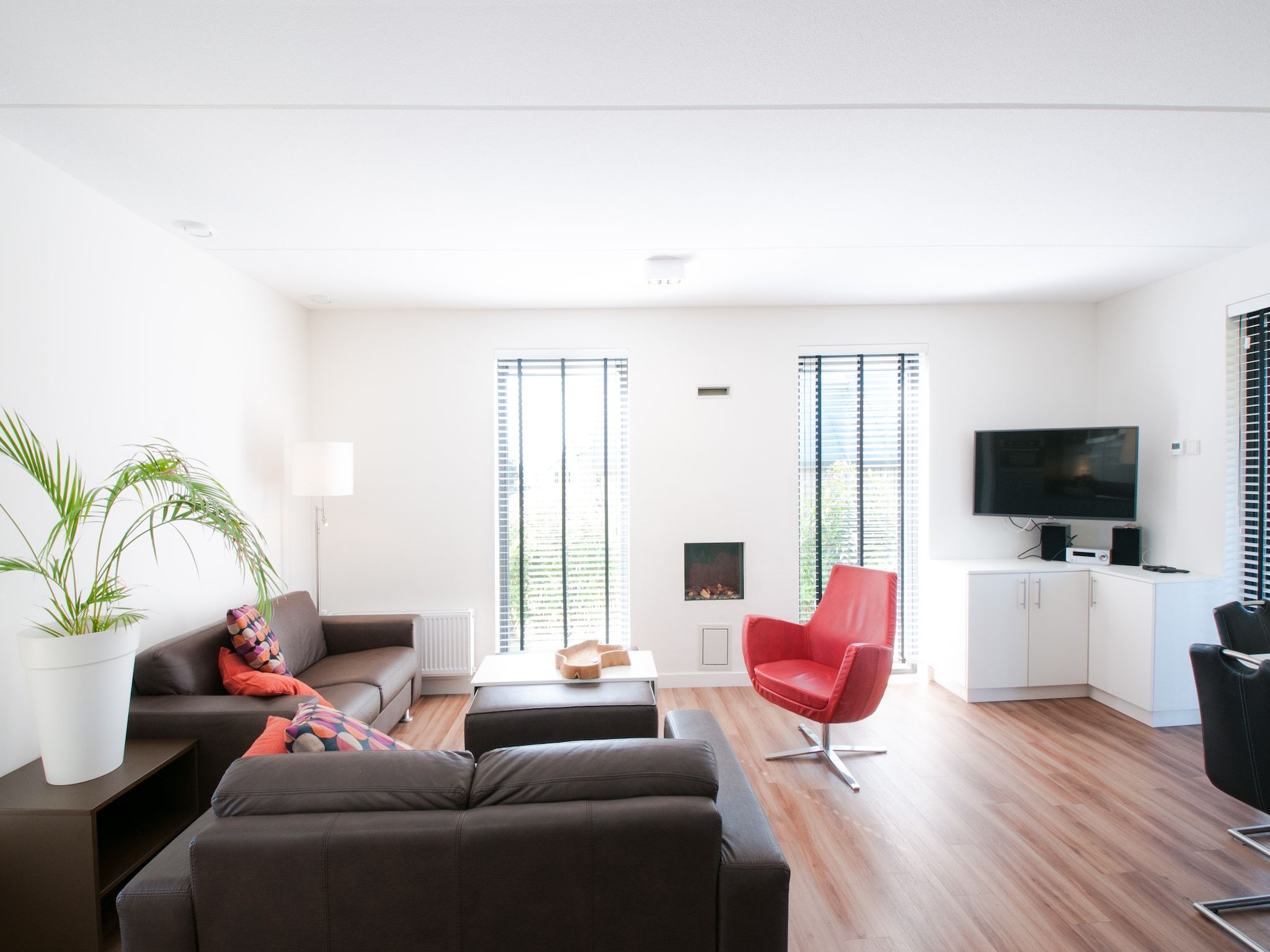 De woonkamer van Resort Waterrijk Oesterdam 6 in Tholen