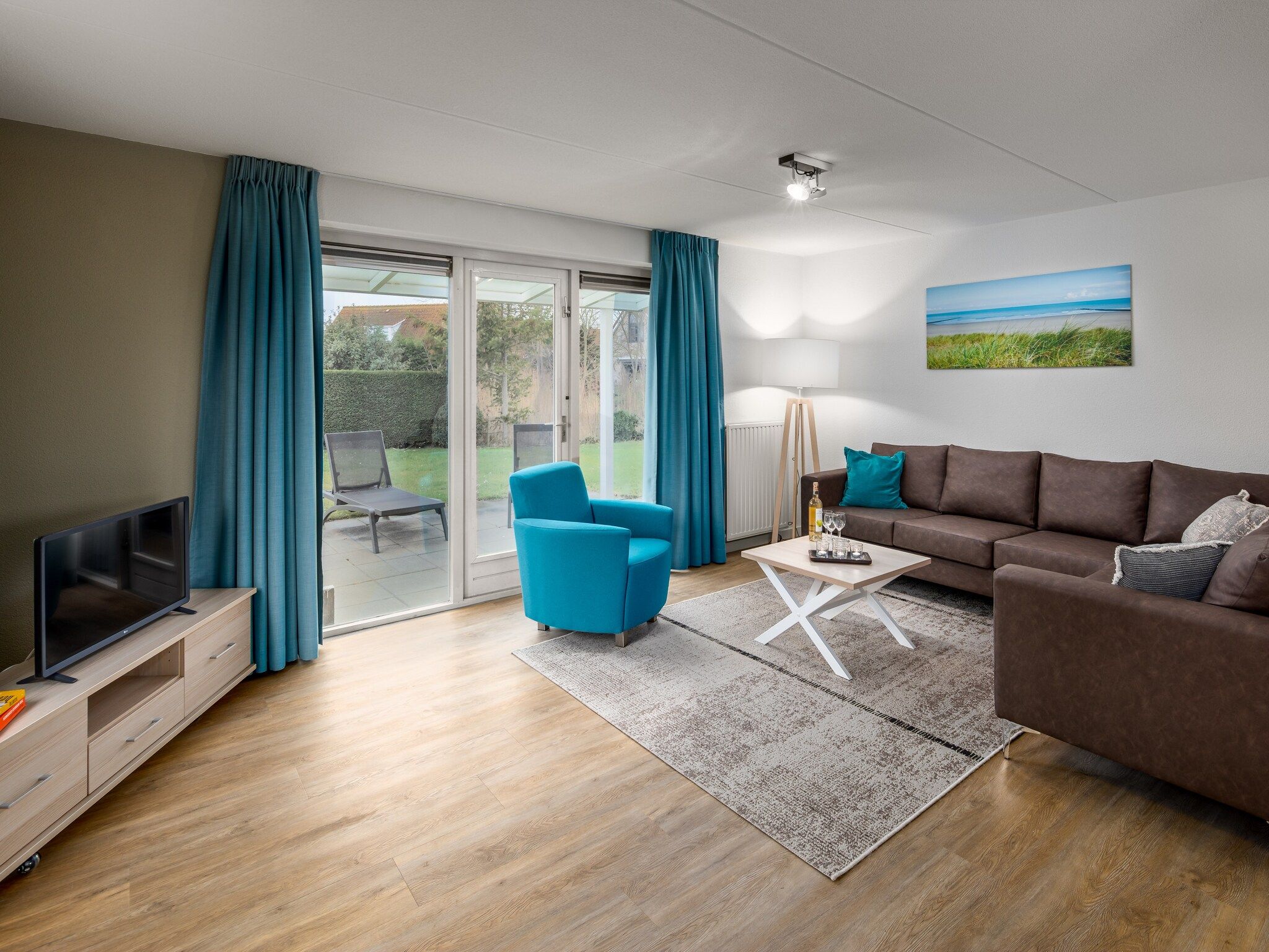 De woonkamer van Vakantiepark Zeebad 10 in Breskens