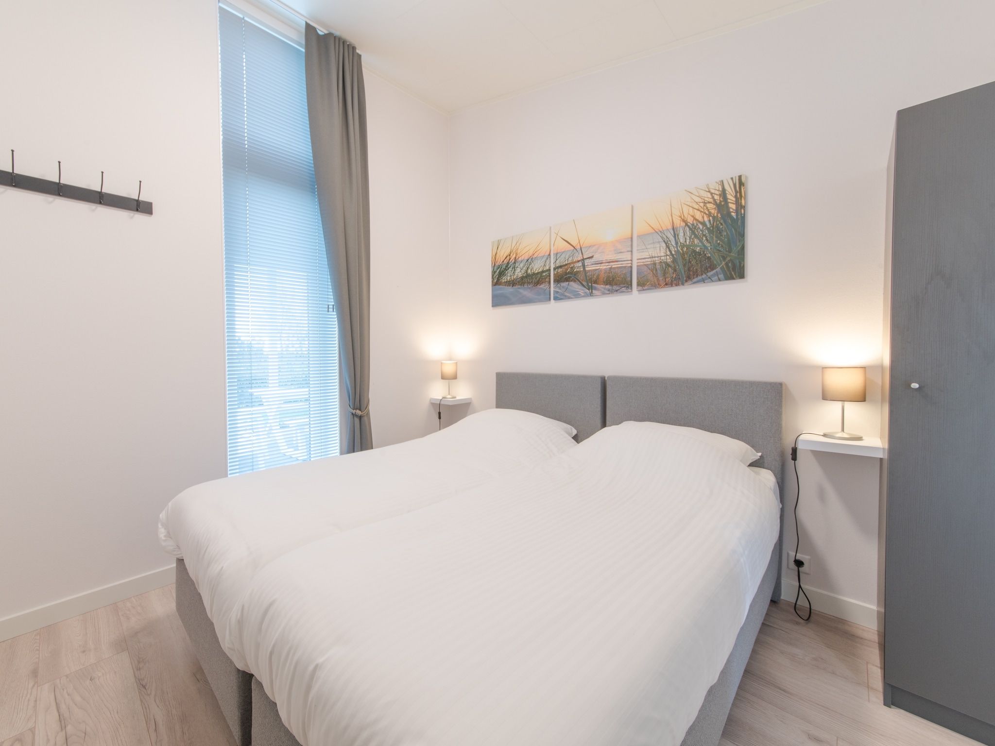 Een slaapkamer van Water Resort Oosterschelde 39 in Wemeldinge