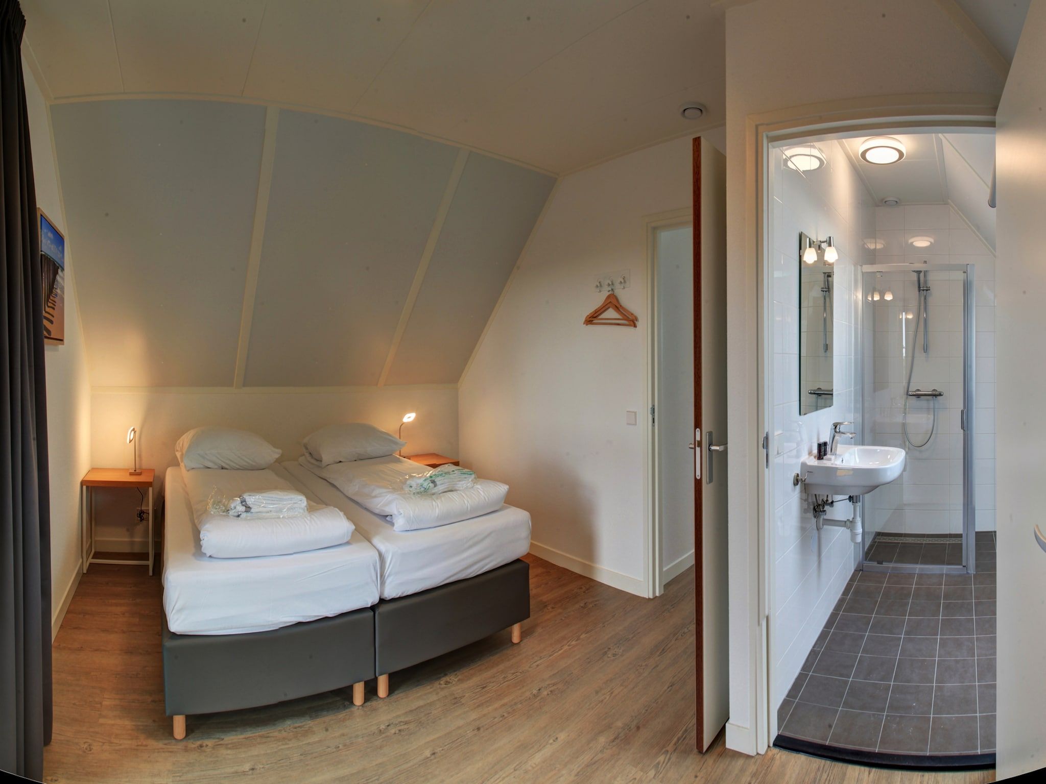 Een slaapkamer van Resort Waterrijk Oesterdam 7 in Tholen