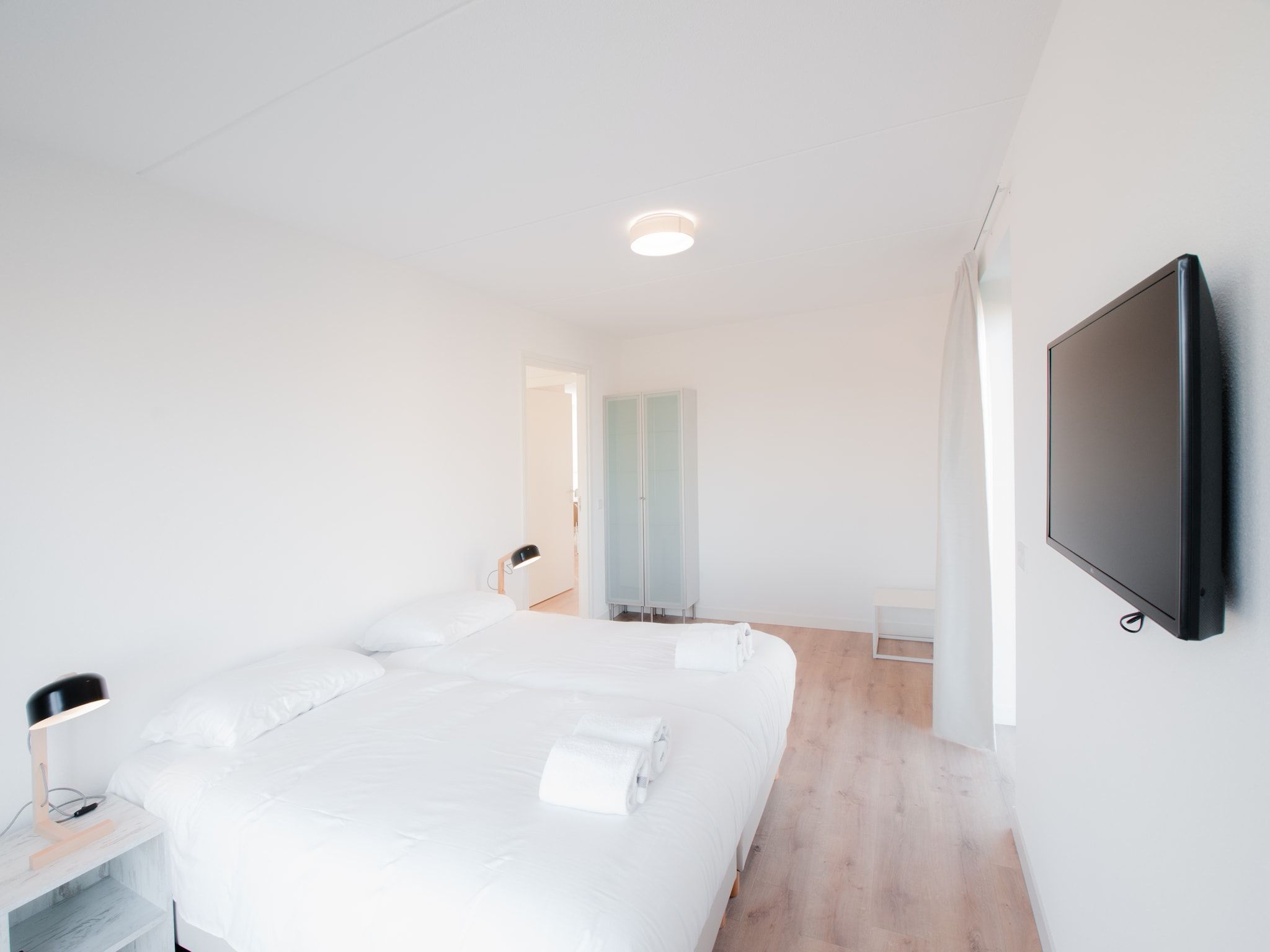 Een slaapkamer van Resort Waterrijk Oesterdam 14 in Tholen