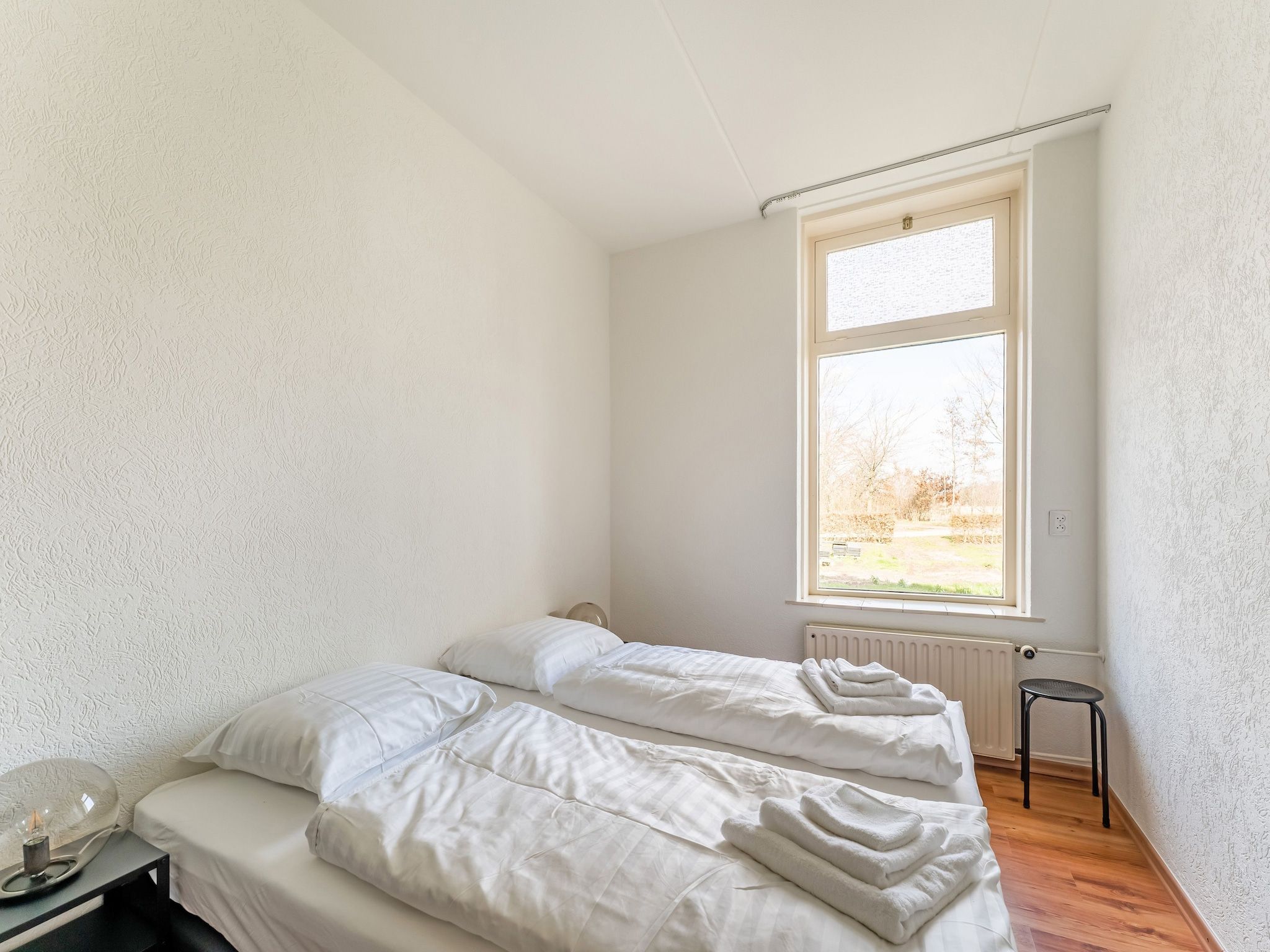 Een slaapkamer van Genieten in Silvolde in Silvolde