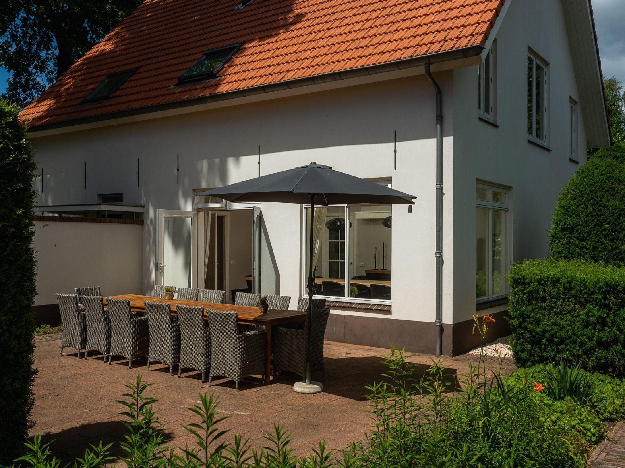 De tuin van Landgoed De IJsvogel 10 in Voorthuizen