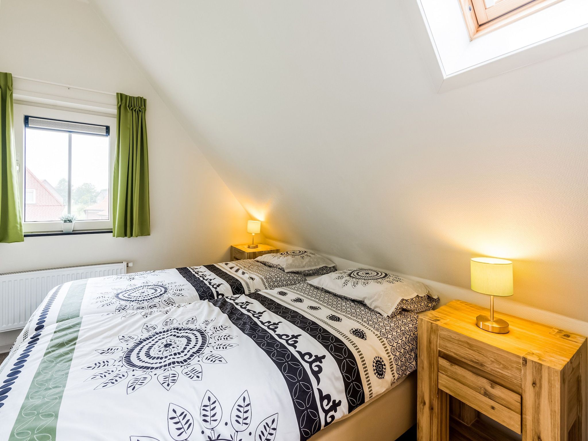 Een slaapkamer van Krokus 18 in Breskens