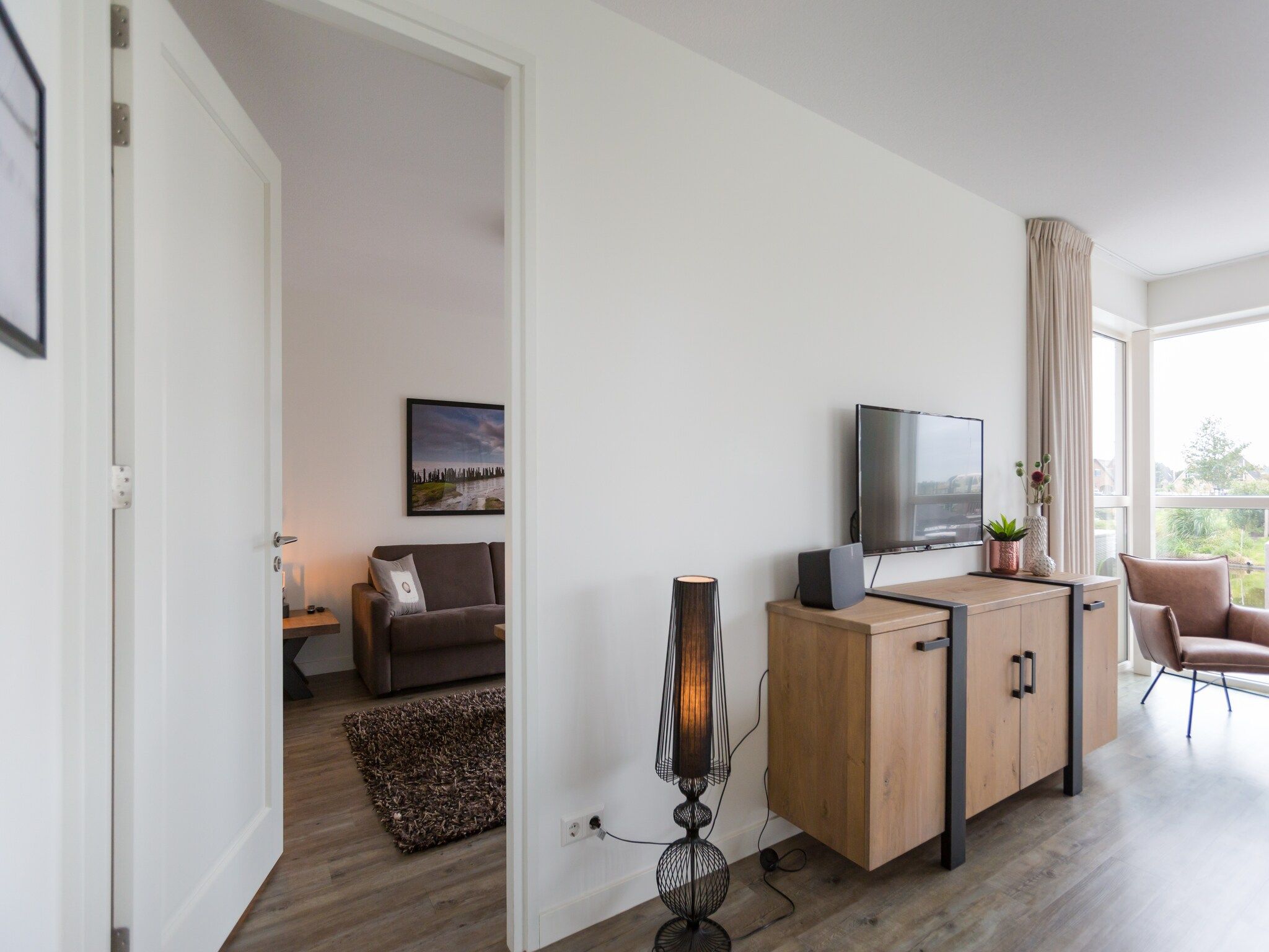 De woonkamer van Friese Meren Villa's 10 in Delfstrahuizen