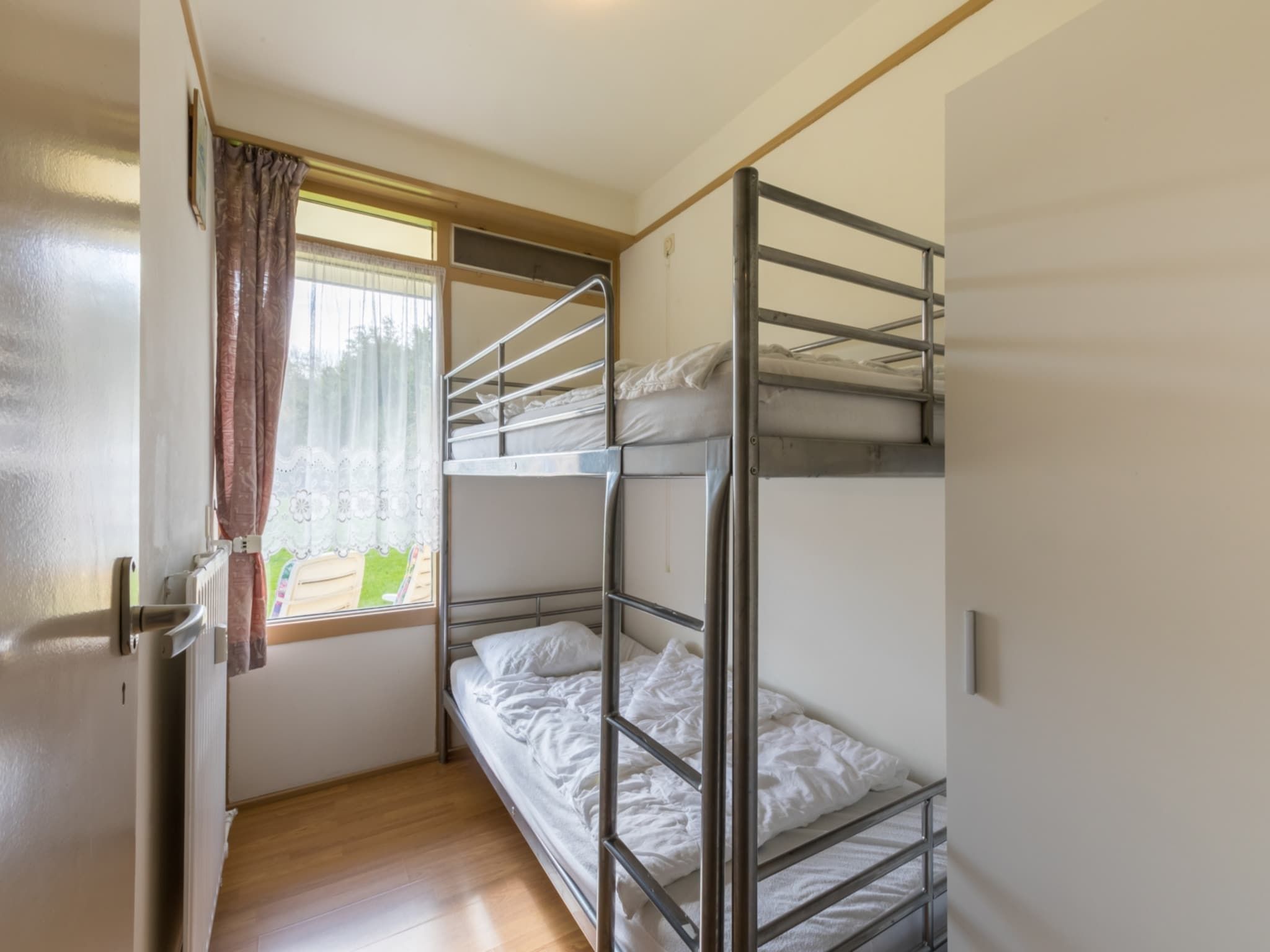 Een slaapkamer van Appartement - Burg van Woelderenlaan 100-2 in Walcheren