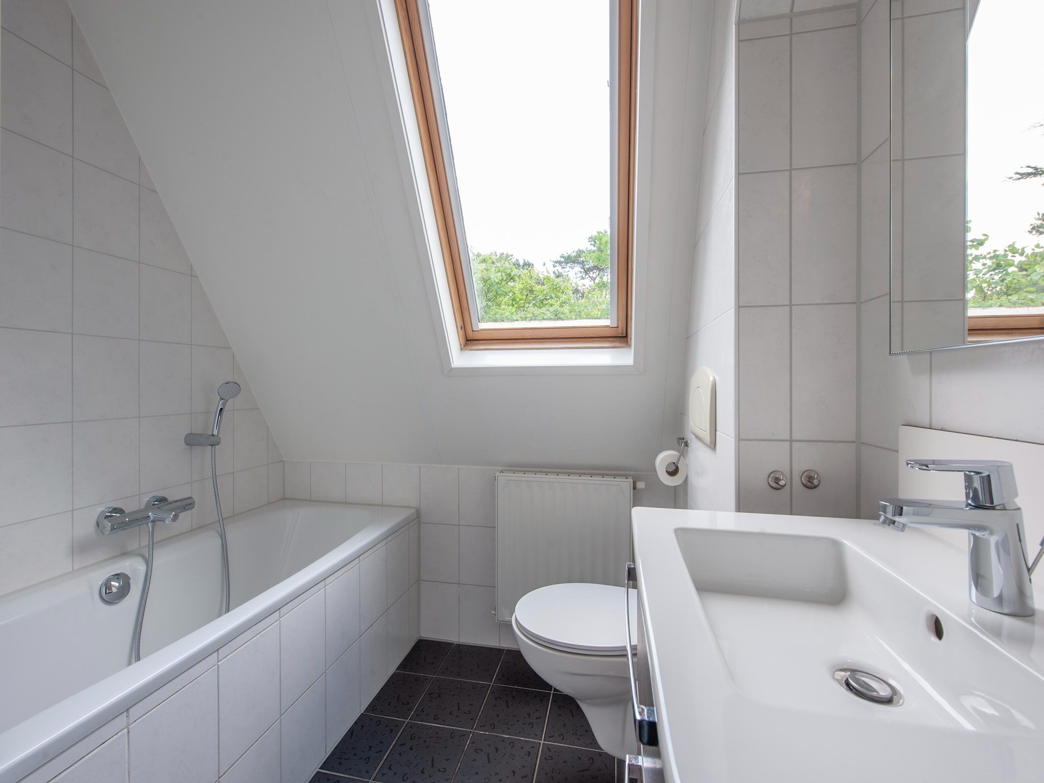 De badkamer van Vakantiepark de Katjeskelder 13 in Oosterhout