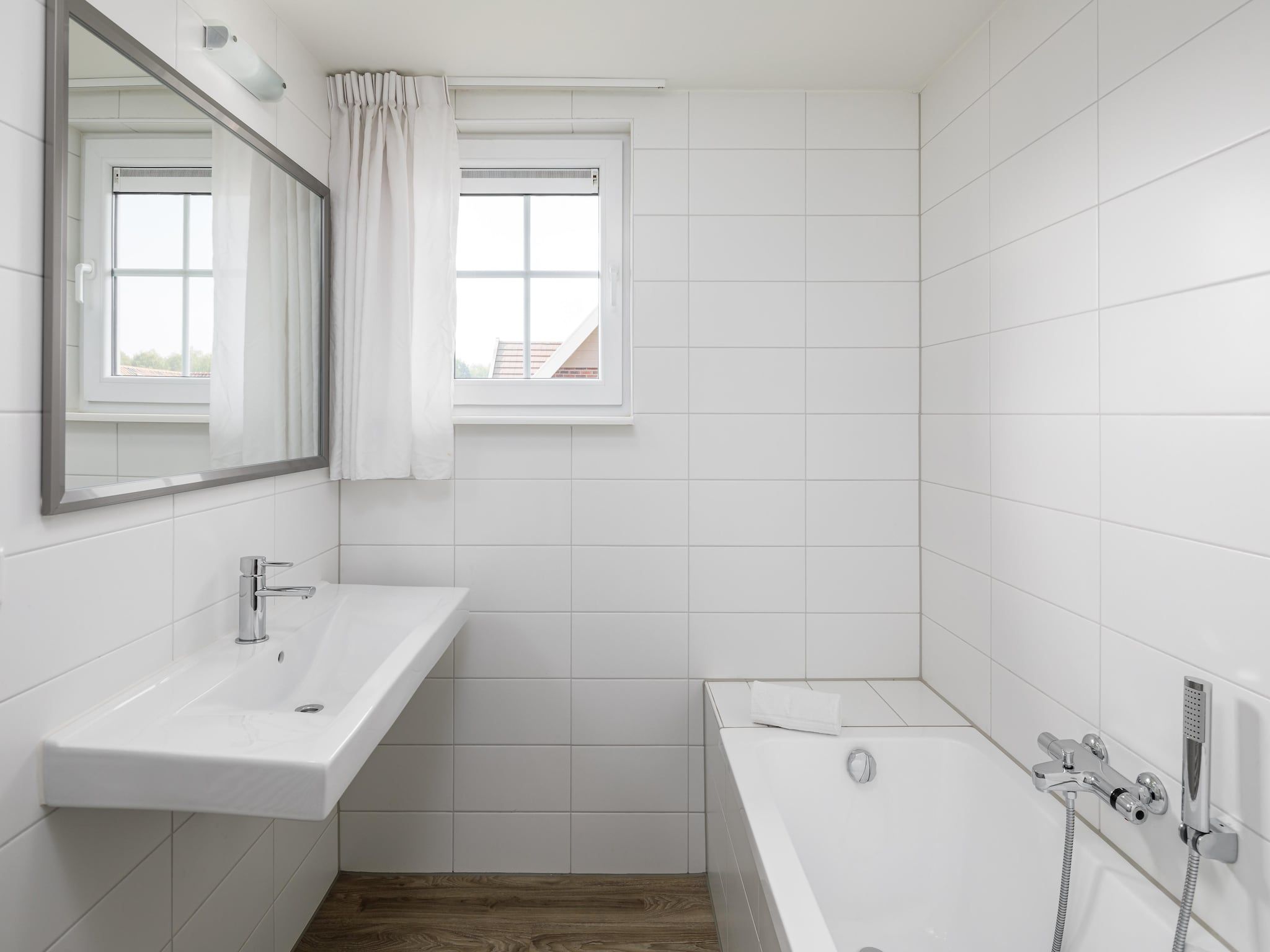 De badkamer van Résidence Klein Vink 7 in Arcen