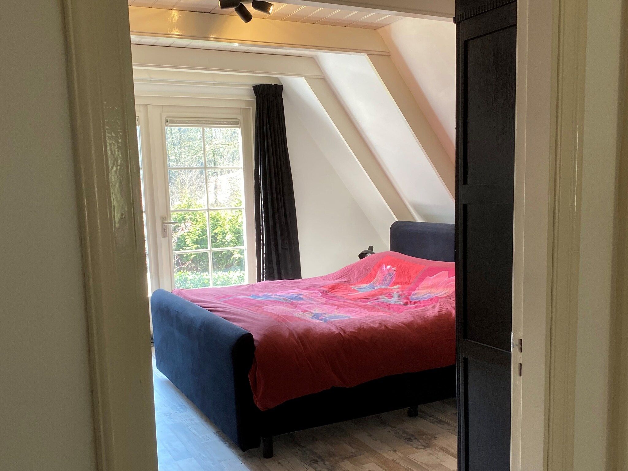 Een slaapkamer van Botterlodge in Wateren