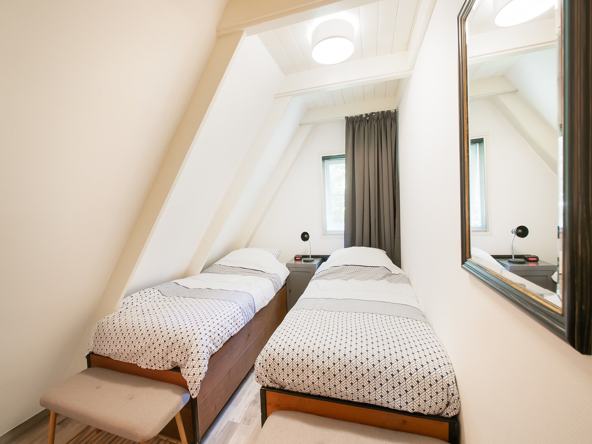 Een slaapkamer van Botterlodge in Wateren